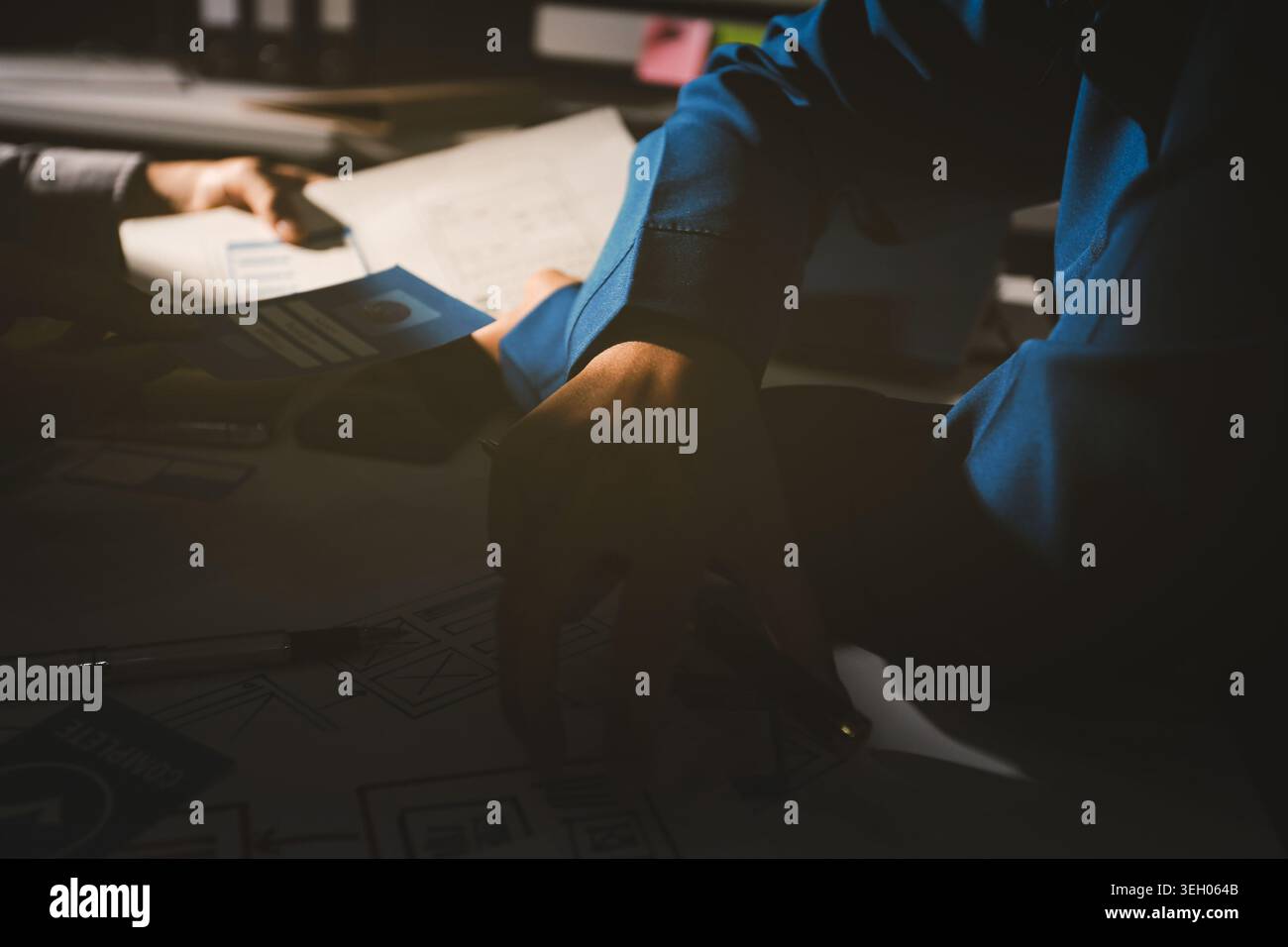Team of Program Developer Collaborating on UXUI Design Planning in a Modern Office Environment Stock Photo
