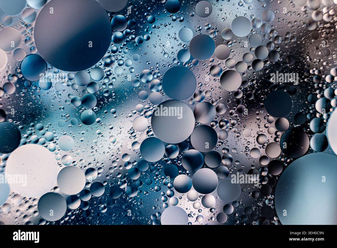 Blue And Teal Droplets With Reflections. Scientific Artistic Scene Of Oil Beads With Soft Background Stock Photo
