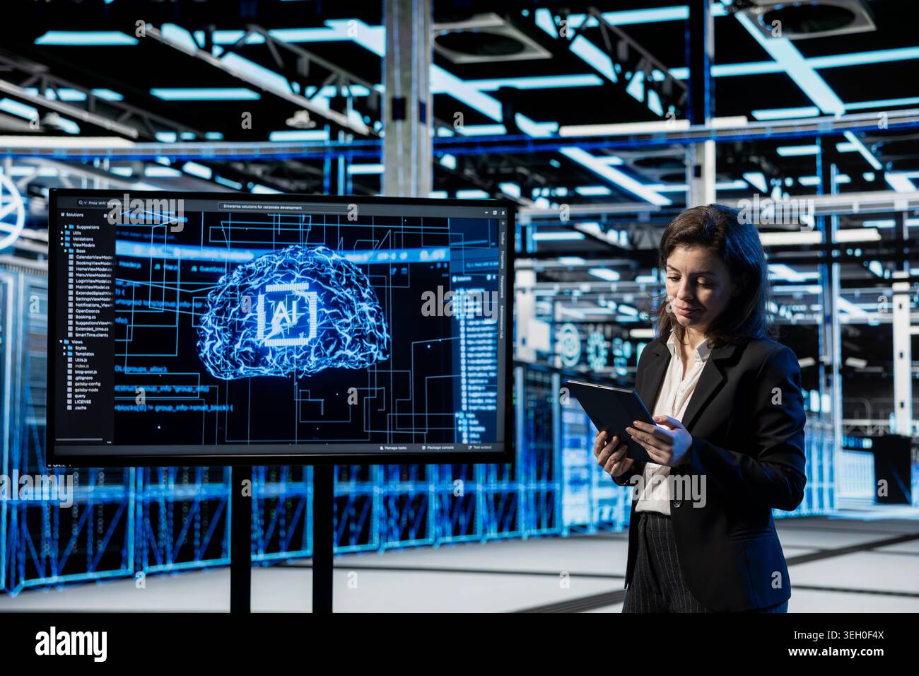 Data center software developer using AI projected on large display to troubleshoot backend operations equipment. Server farm employee running deep learning application on tablet, solving system bugs Stock Photo