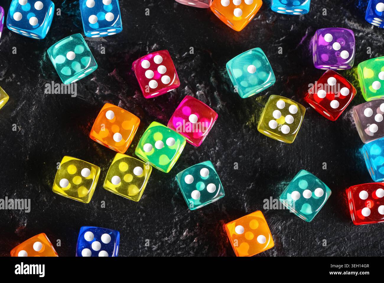 Colorful game dices on black background Stock Photo