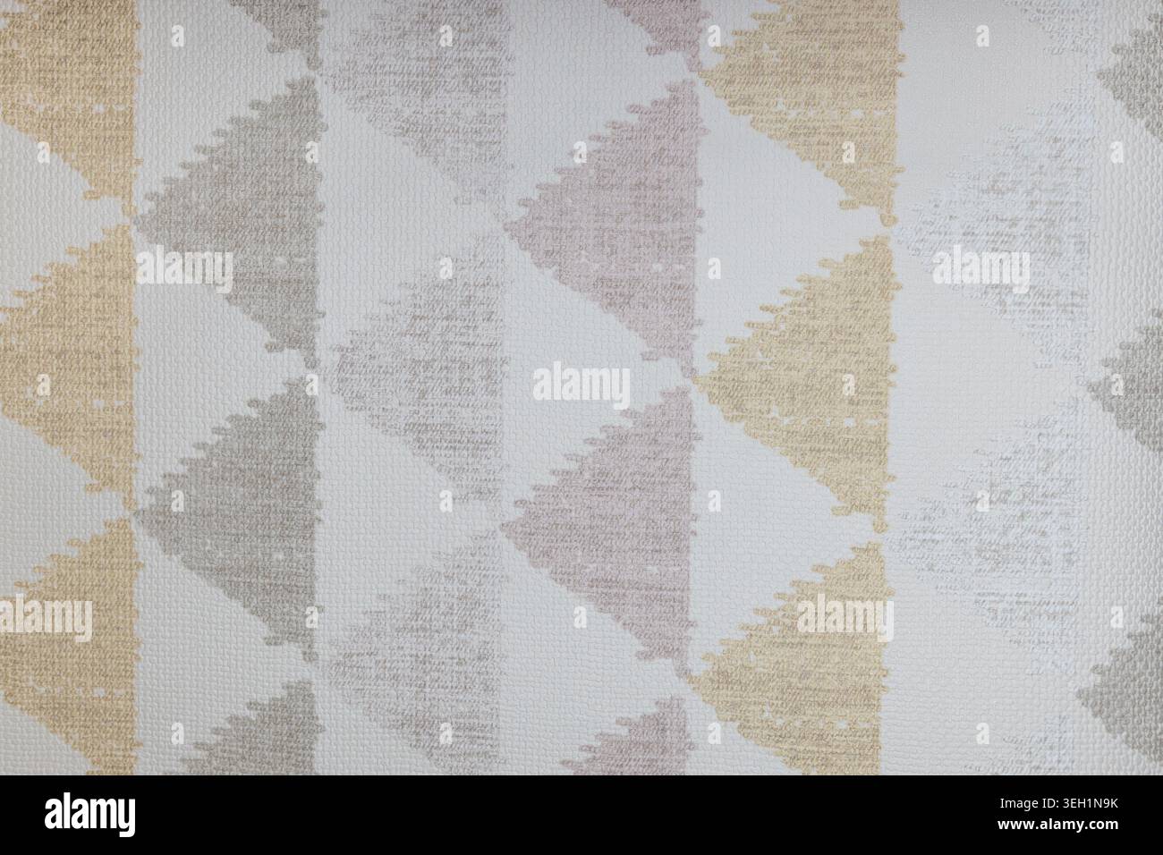 Geometric triangle pattern on light grey fabric background Stock Photo
