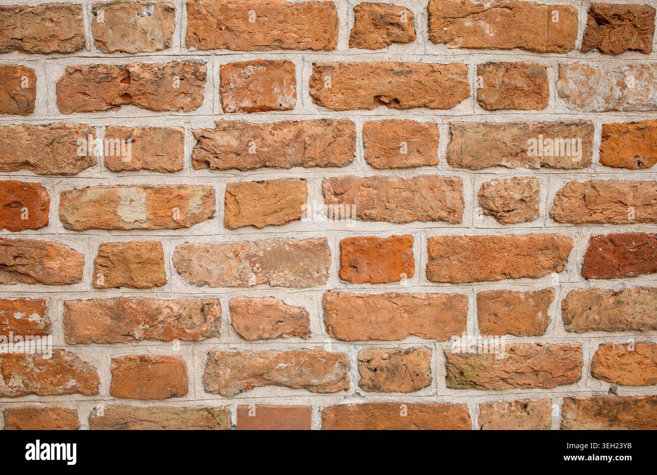 Real old red brick wall close up background Stock Photo