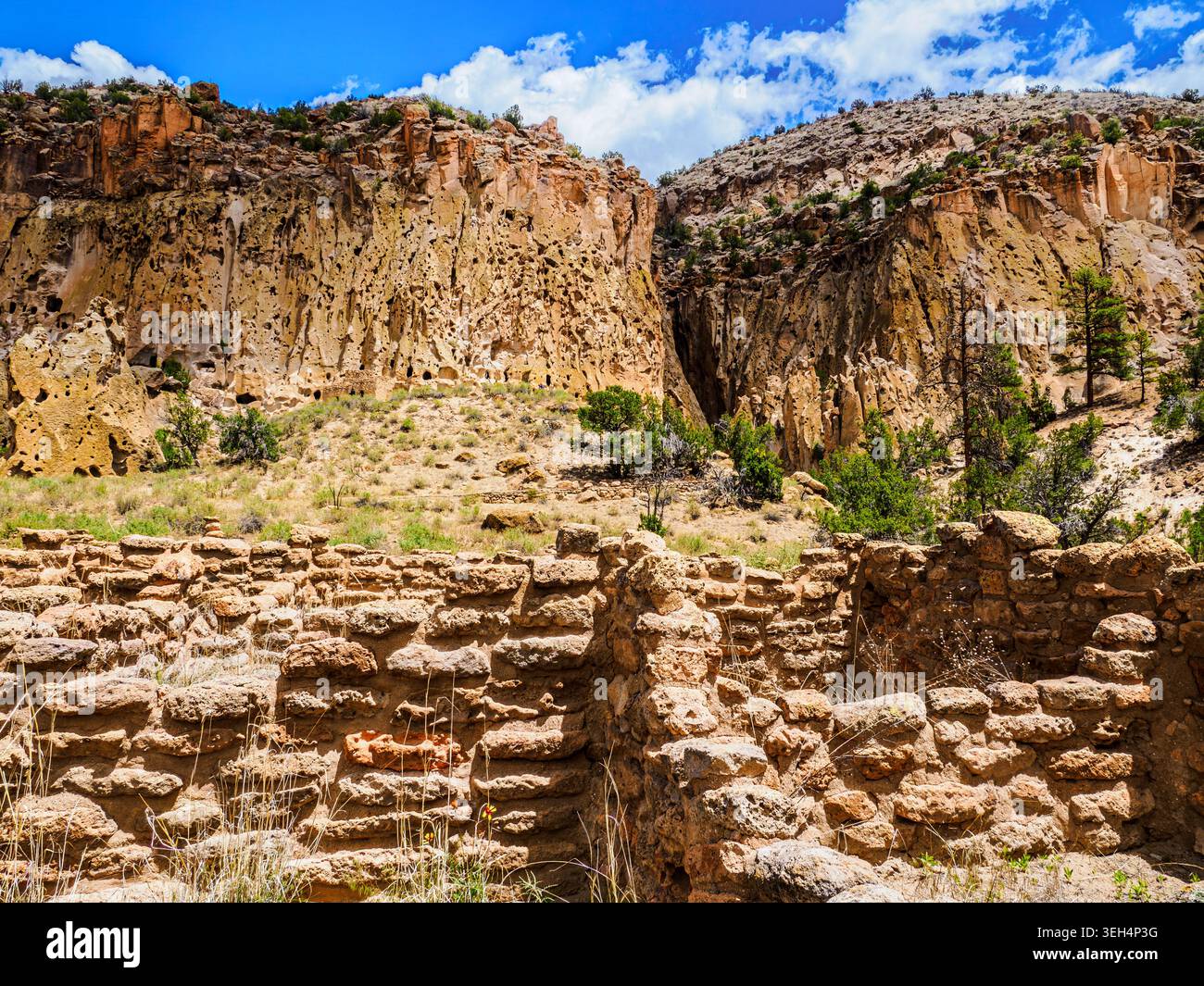 Ruins of ancient Puebloan homes near the cliffs where their cave dwellings are still found Stock Photo