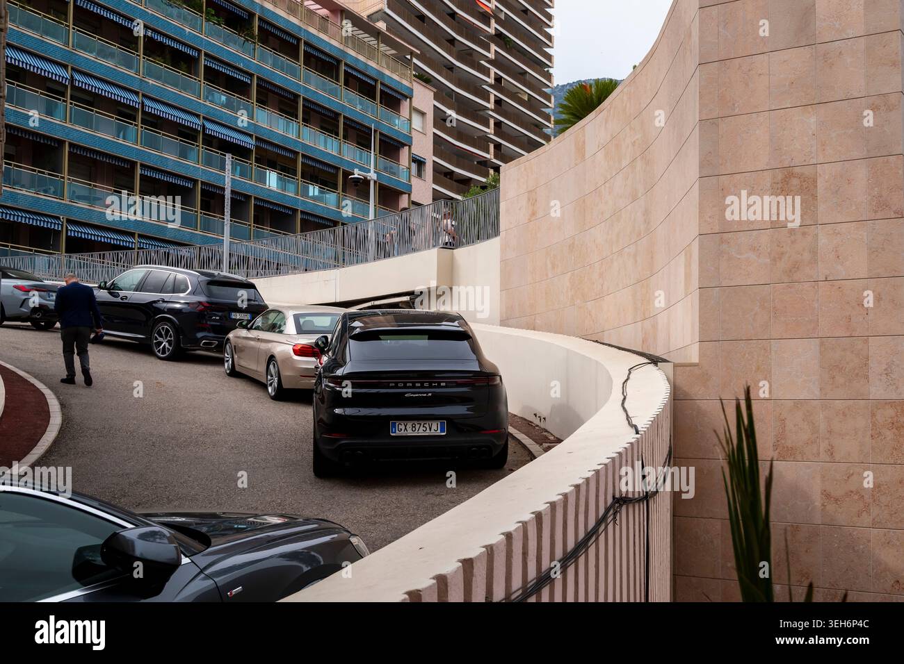 Monte Carlo, Monaco 12 April 2026 Luxury cars along a curving ...