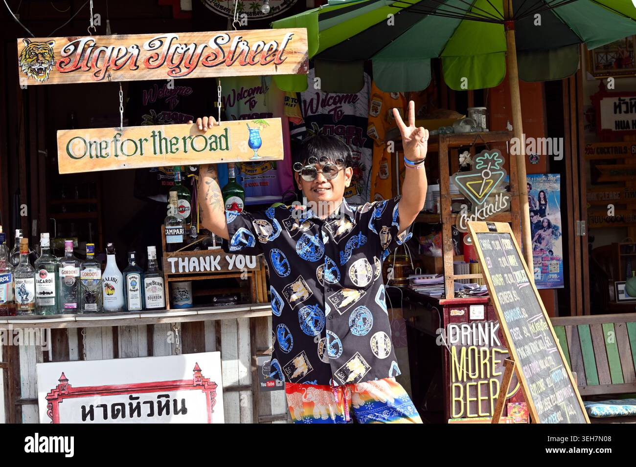 A restaurant owner dresses lavishly and acts flamboyantly to attract customers in Hua Hin, Thailand. Stock Photo