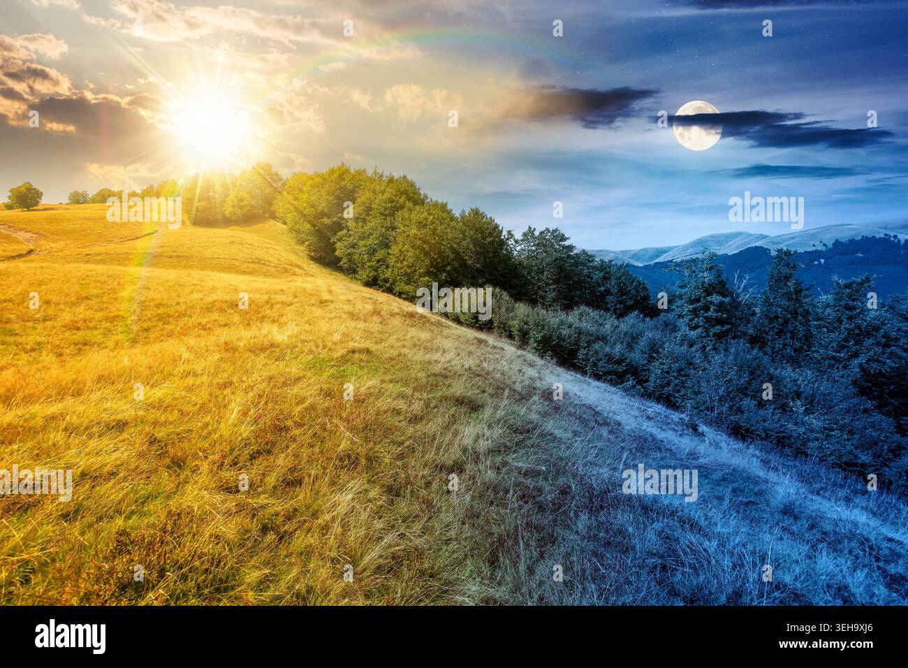 day meet night above carpathian mountain field. view of countryside landscape with valley behind the forest on the hill. sun and moon over clouds on a Stock Photo