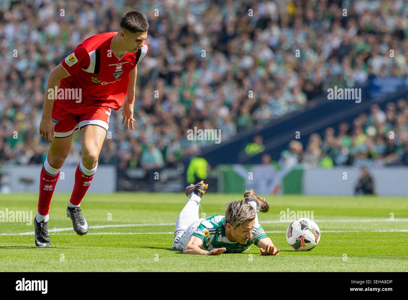 Glasgow, UK. 23rd May, 2026. Celtic played Dunfermline Athletic at Hampden Park, Glasgow, Scotland, Uk in the final of the Scottish Gas Men's Scottish Cup. The final score was Celtic 3 - 1 Dunfermline Athletic. Celtic team were presented with the Scottish Cup at the end of the game. Daizen Maeda (C38) falls to the ground claiming a foul, that was not given. Credit: Findlay/Alamy Live News Stock Photo
