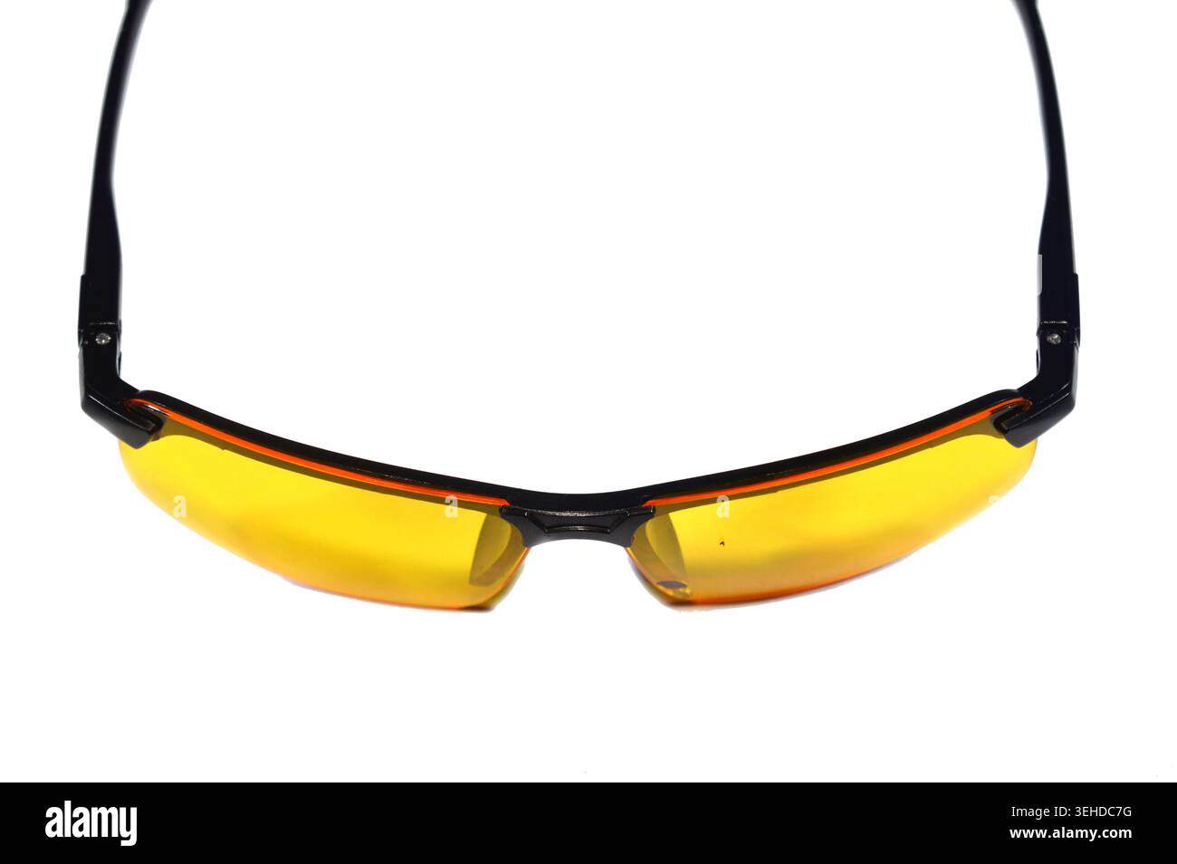 polarized night driving glasses with yellow lenses designed to reduce glare from headlights and streetlights, a yellow night driving glasses Stock Photo