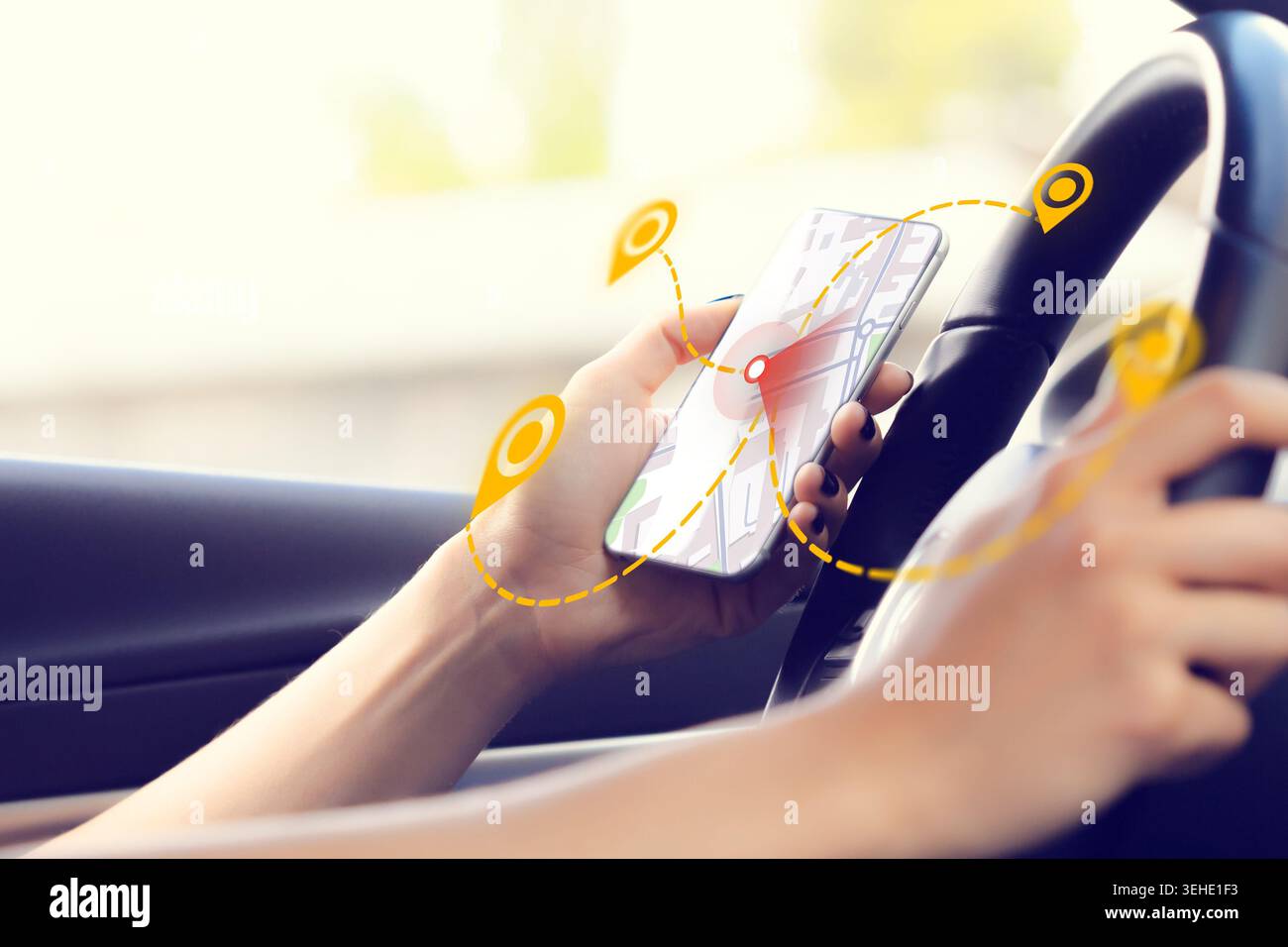 Person using a smartphone for taxi location on a map while driving Stock Photo