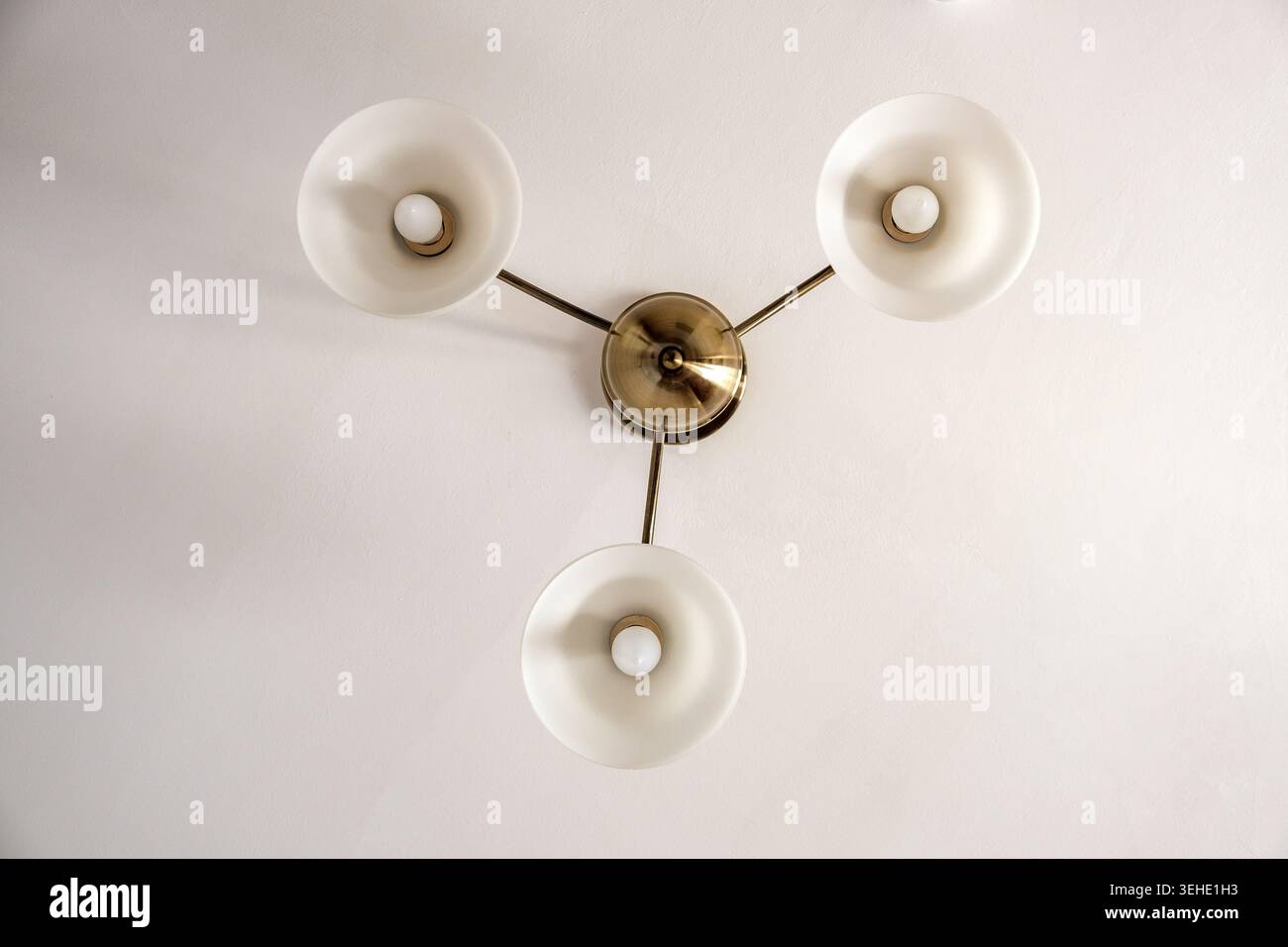 ceiling chandelier with three shades, bottom view Stock Photo