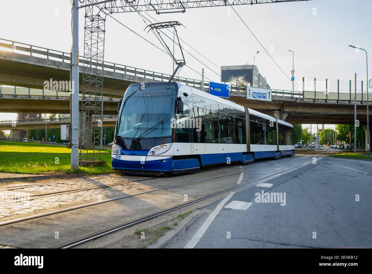 Modern white electric tram moving hi-res stock photography and images ...