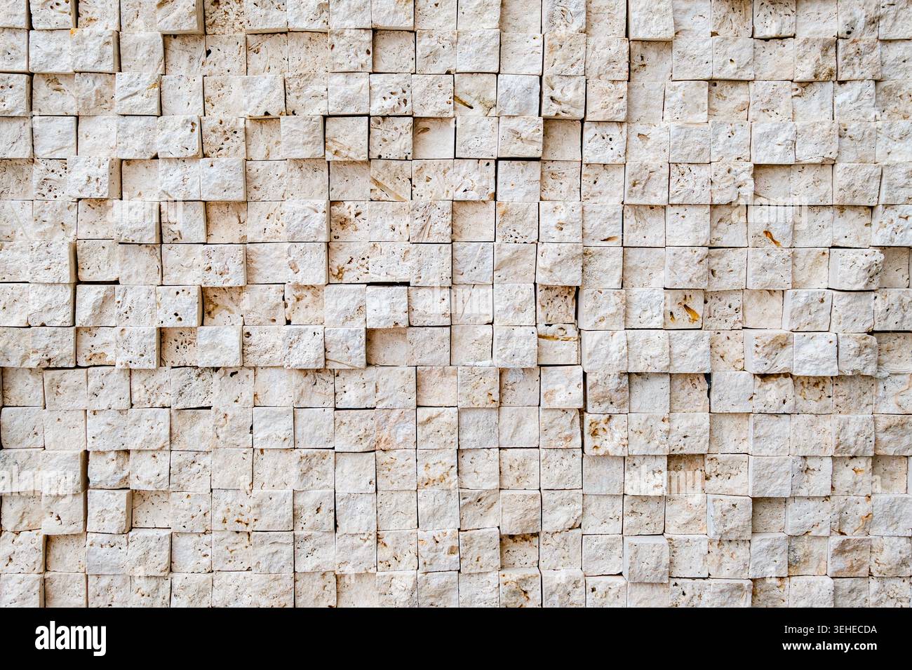 background of wall lined with square stones Stock Photo