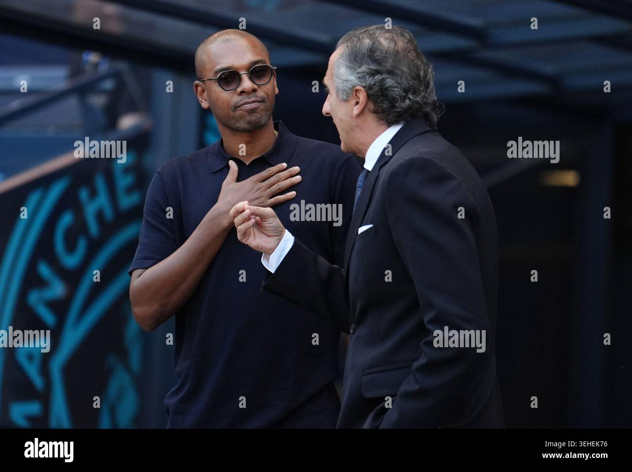 Former Manchester City player Fernandinho (left) before the Premier ...