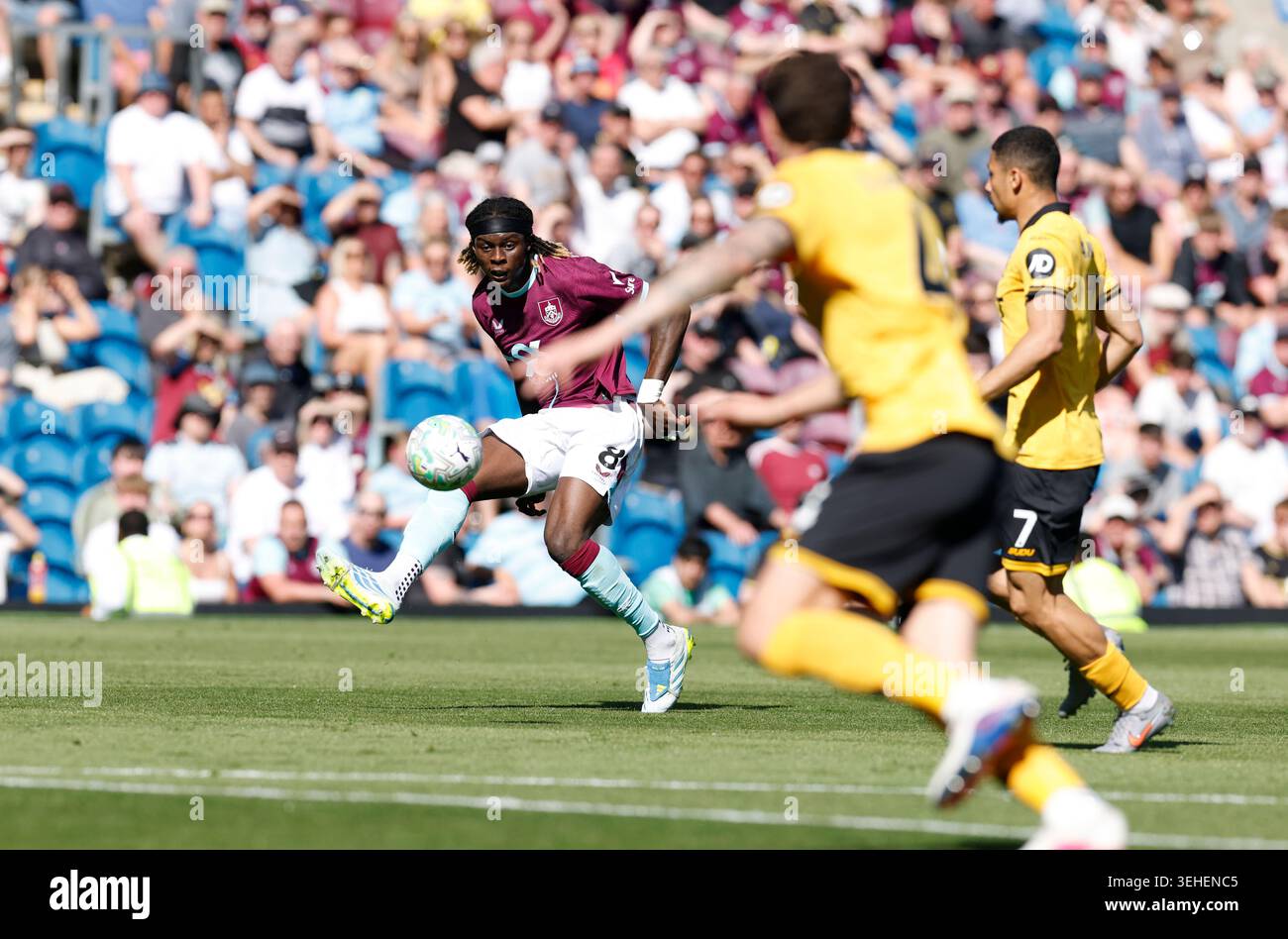 Burnley's Lesley Ugochukwu crosses the ball during the Premier League ...