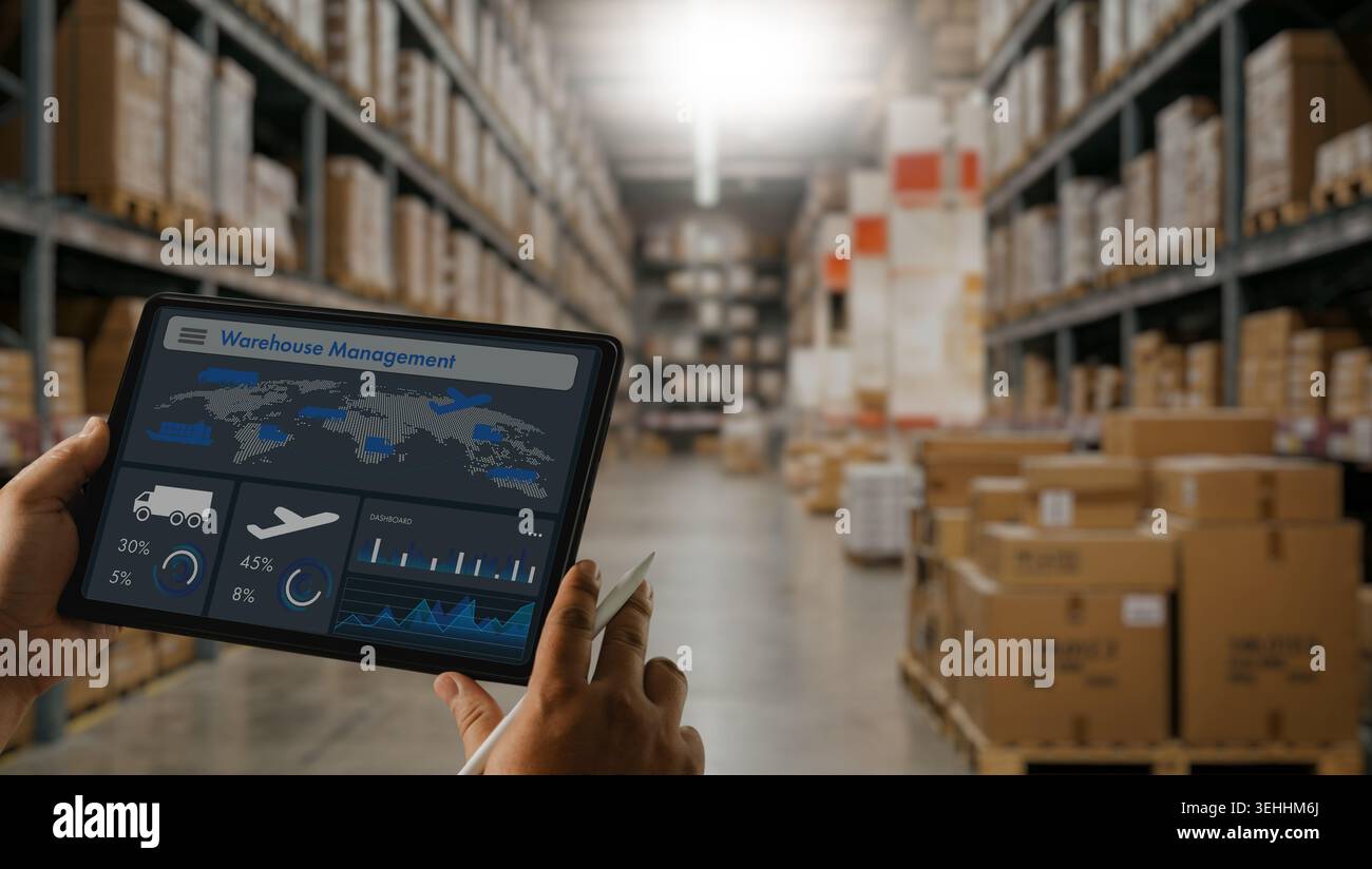 Warehouse staff using tablet dashboard for inventory tracking, shipping ...