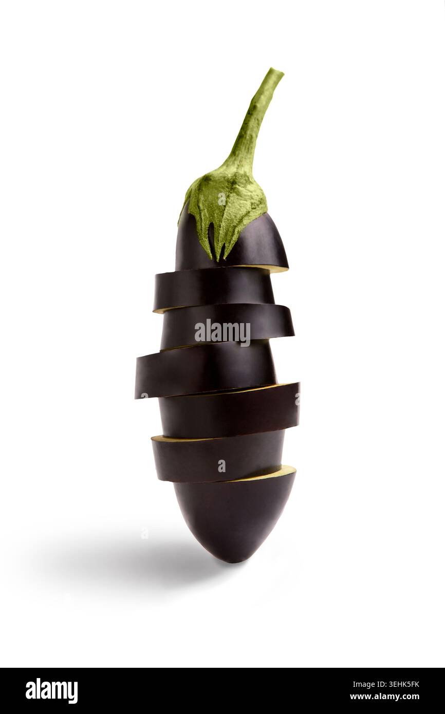 Sliced eggplant or aubergine vegetable isolated on white Stock Photo