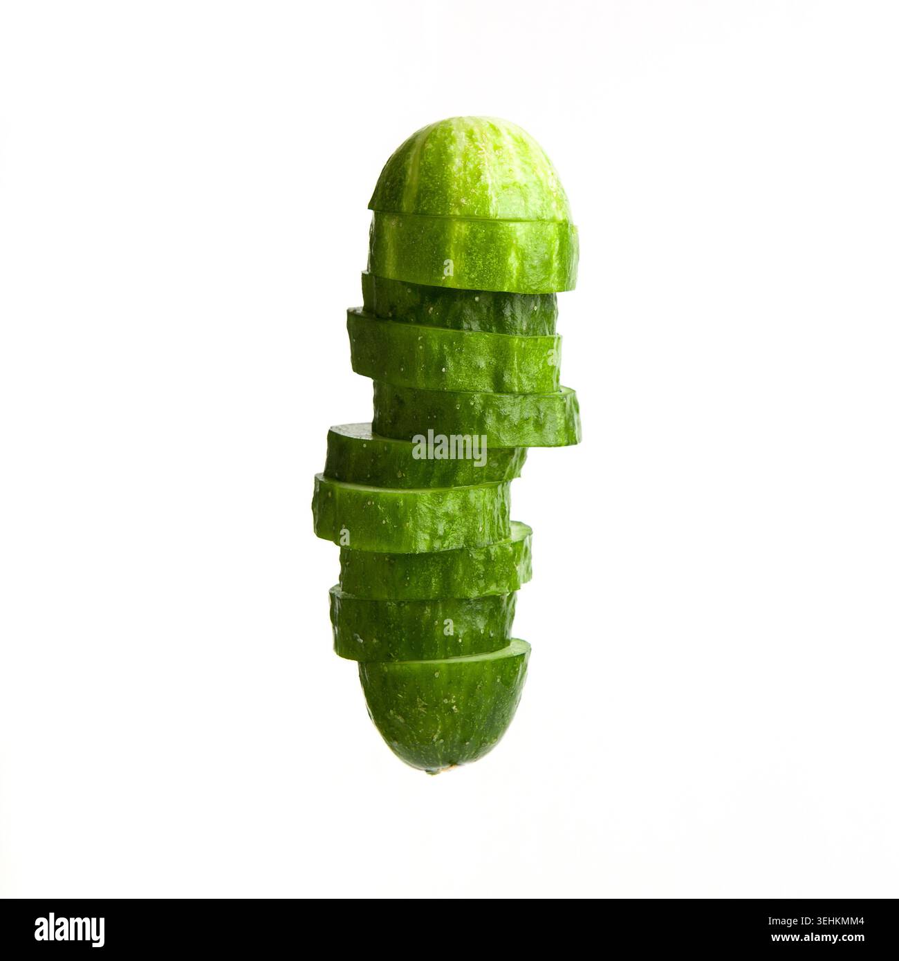 Fresh sliced cucumber isolated on white background Stock Photo