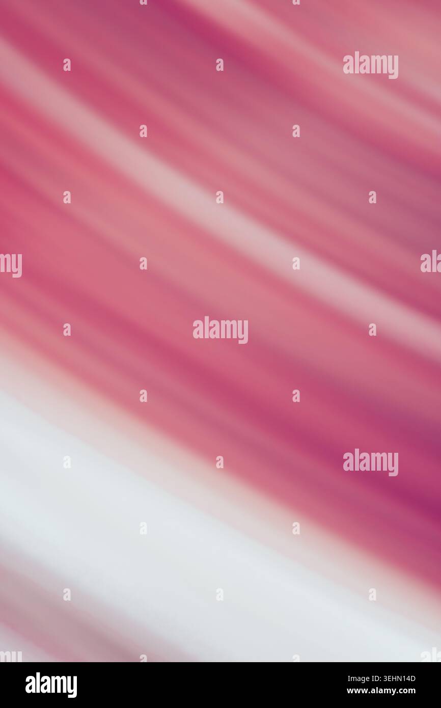 Abstract pink motion blur background with diagonal stripe and soft gradient tones. Smooth defocused texture suggests speed, flow, and modern design fo Stock Photo