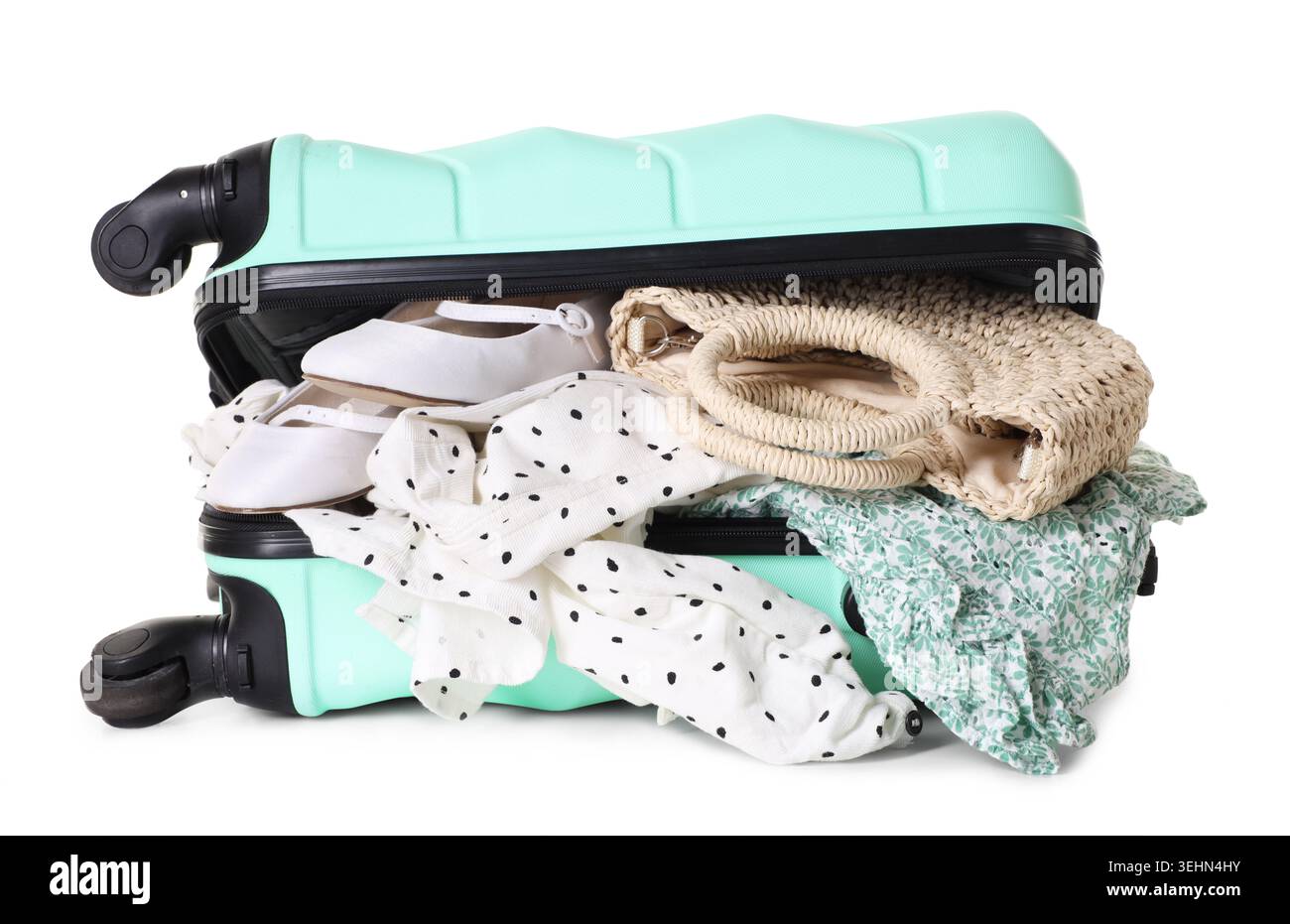 Suitcase with packed stuff isolated on white Stock Photo