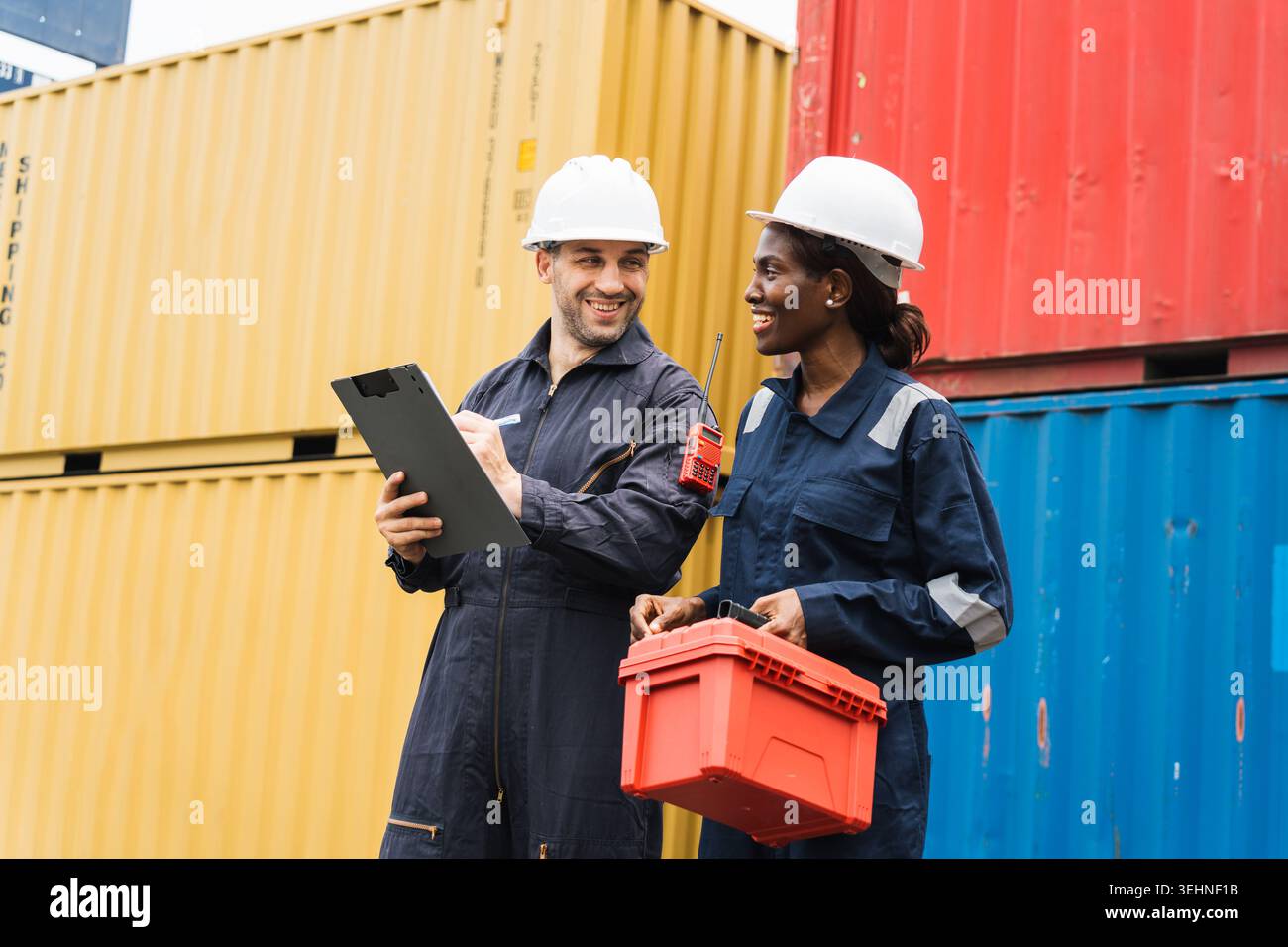 Cargo Checking Multiethnic logistics team discussing with checking cargo inventory ...