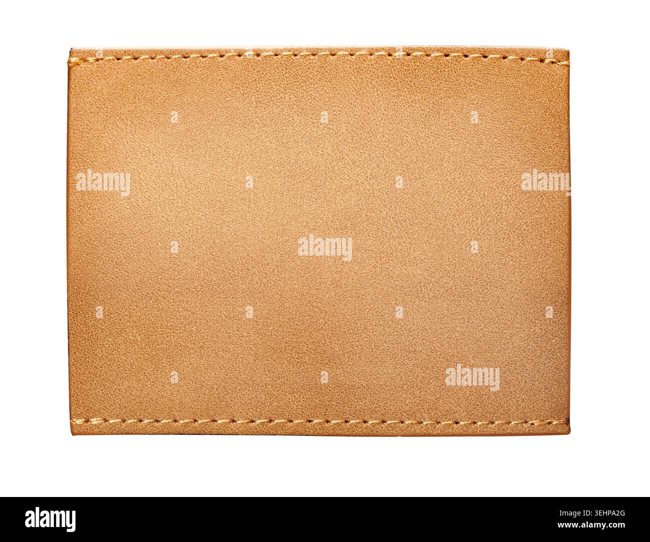 Rectangular tan leather patch displaying stitched edges and a textured surface Stock Photo