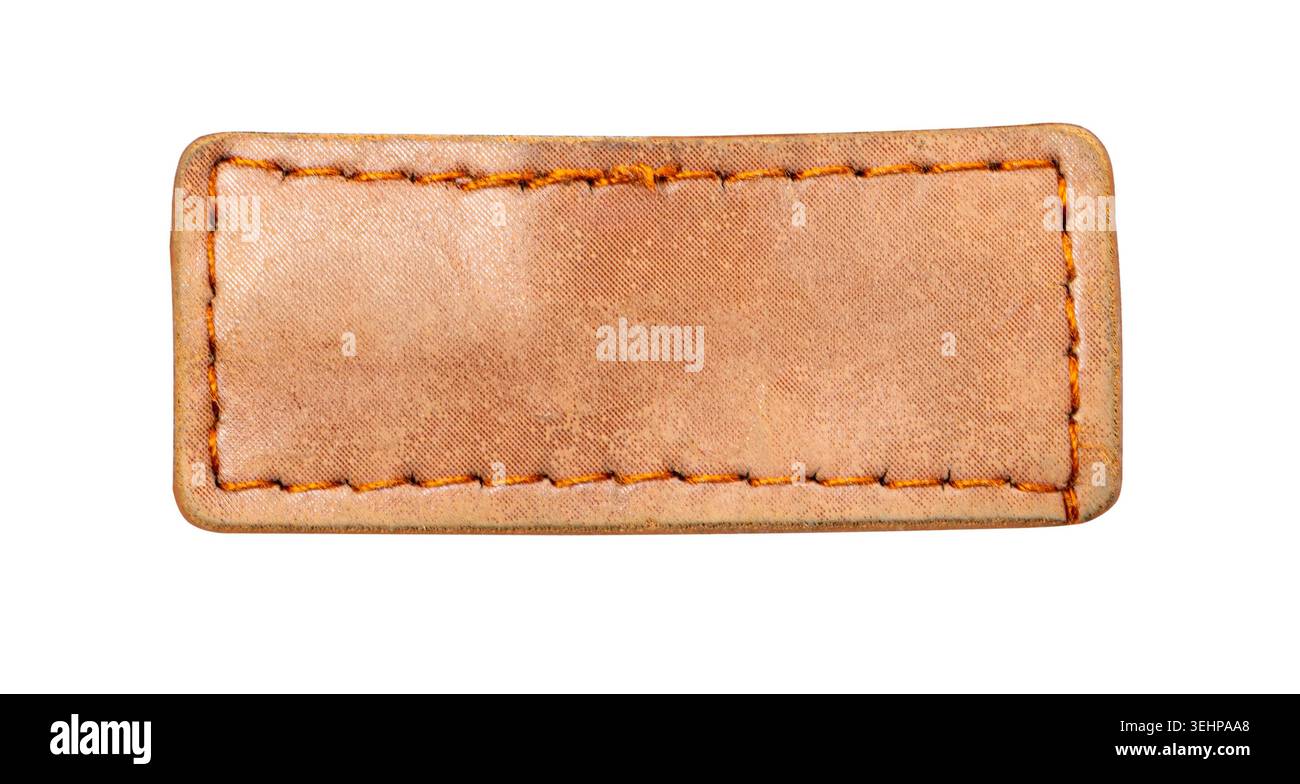 Rectangular blank brown leather label with orange stitching, isolated for design Stock Photo