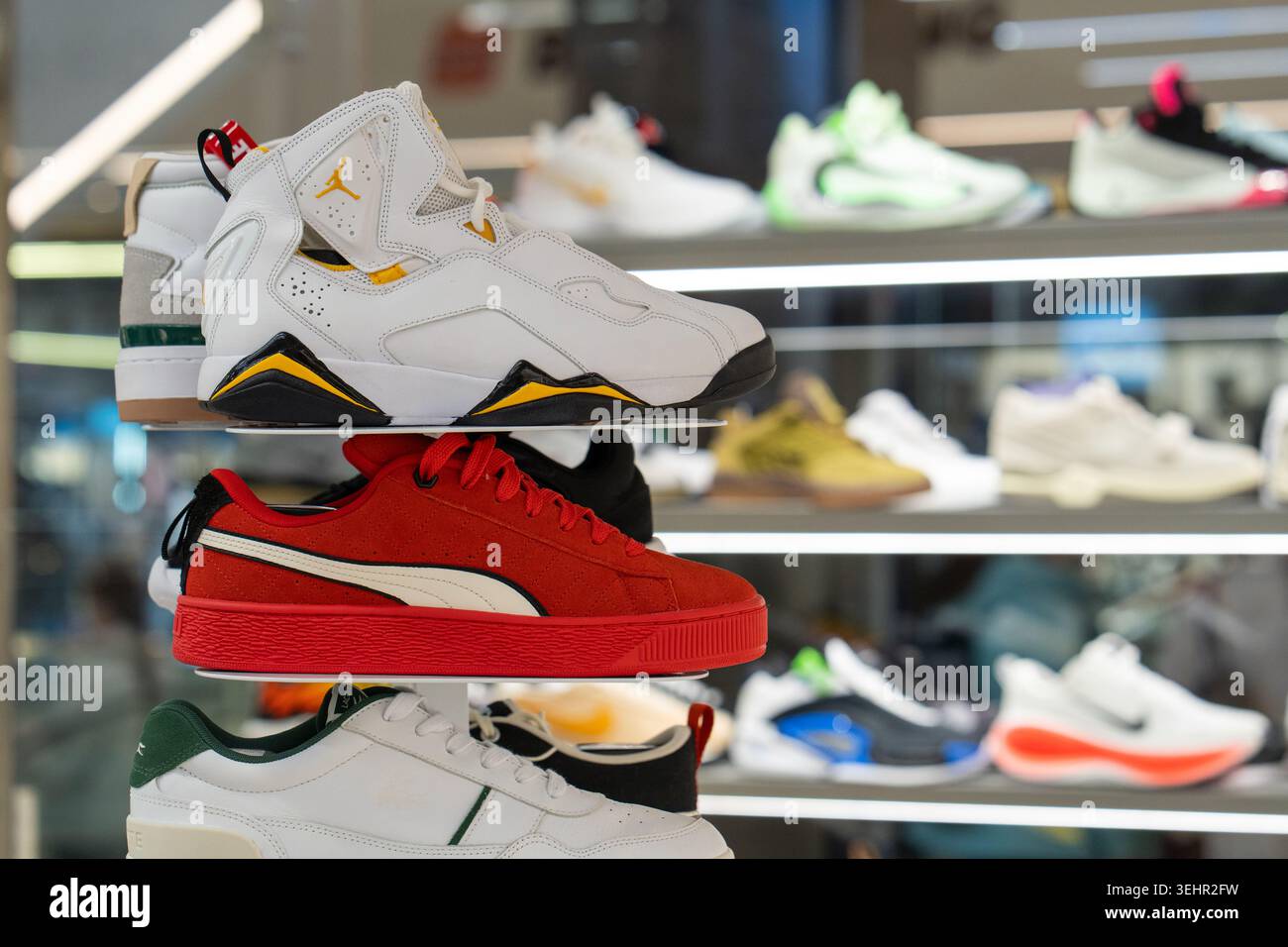 Puma shop interior sneakers display hi-res stock photography and