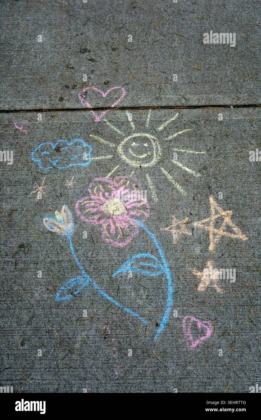Children chalk drawings on sidewalk hi-res stock photography and images ...