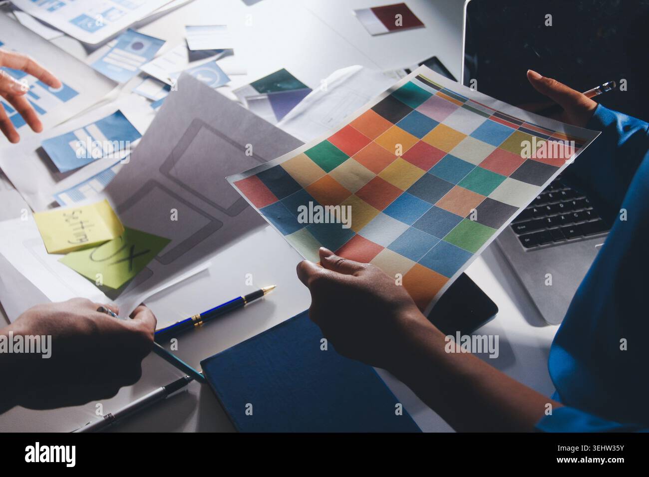 UXUI design brainstorming session with sketches and digital tools Stock Photo