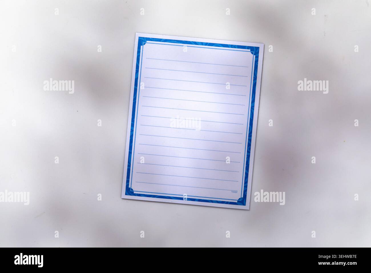 Blank lined notepad on white background Stock Photo