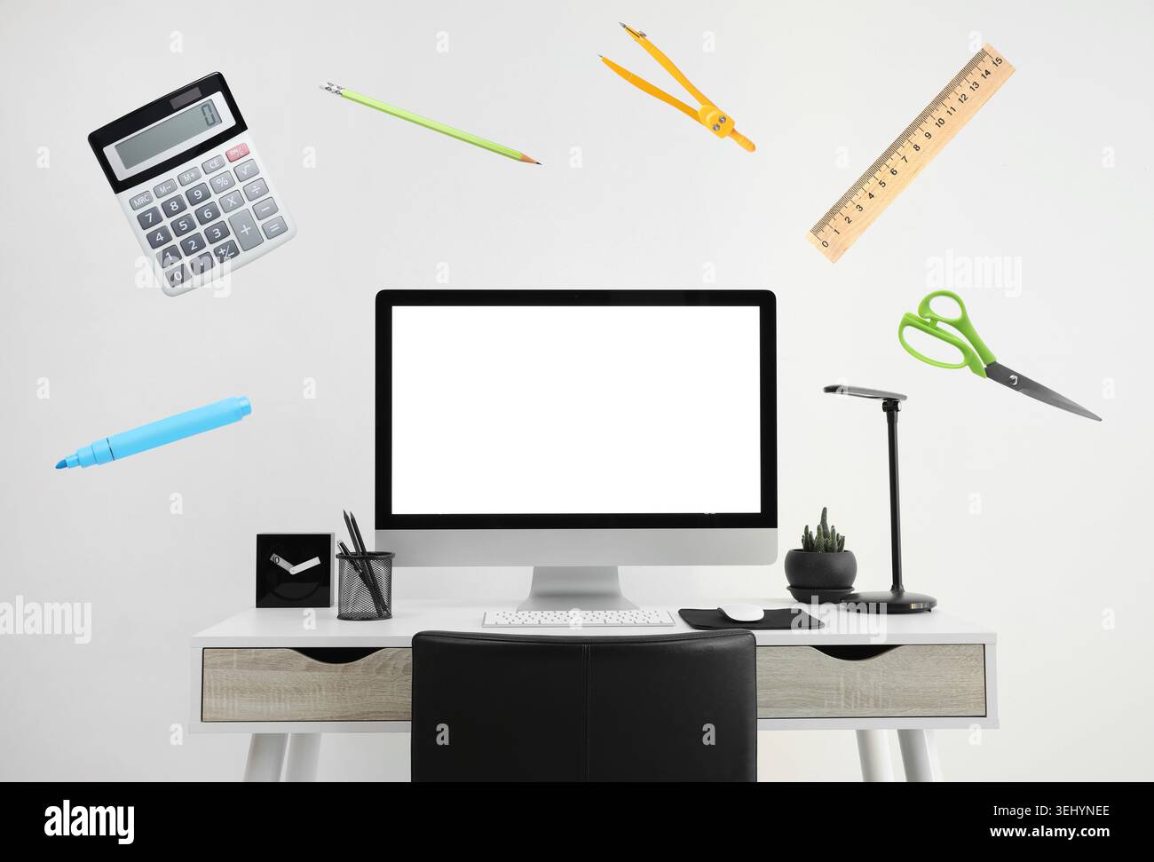 Web design tools flying around computer. Creative designer workspace Stock Photo