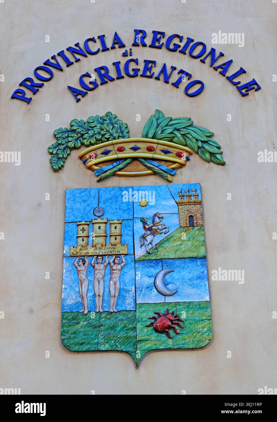 Former Provincia Regionale di Agrigento crest on a public building in Agrigento, Sicily, Italy. Stock Photo