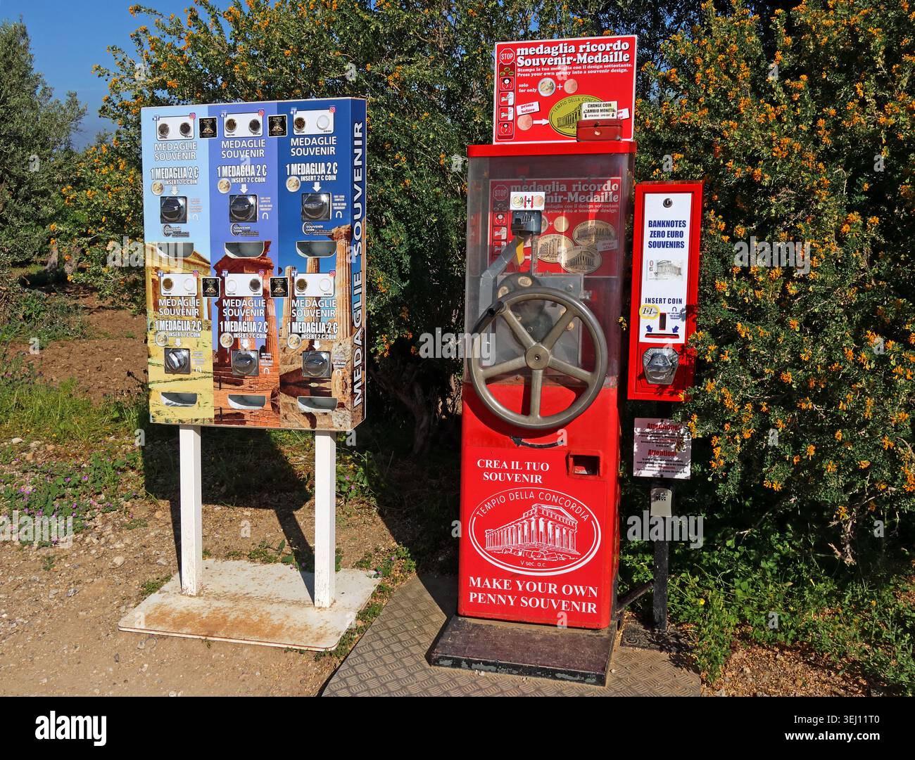 Souvenir coin and medal vending machines at the Valley of the Temples, Agrigento, Sicily, Italy. Stock Photo