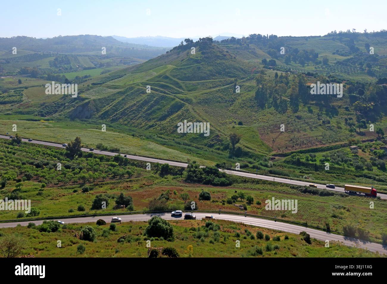Green inland Sicilian landscape viewed from the Valley of the Temples archaeological park, Agrigento, Italy. Stock Photo