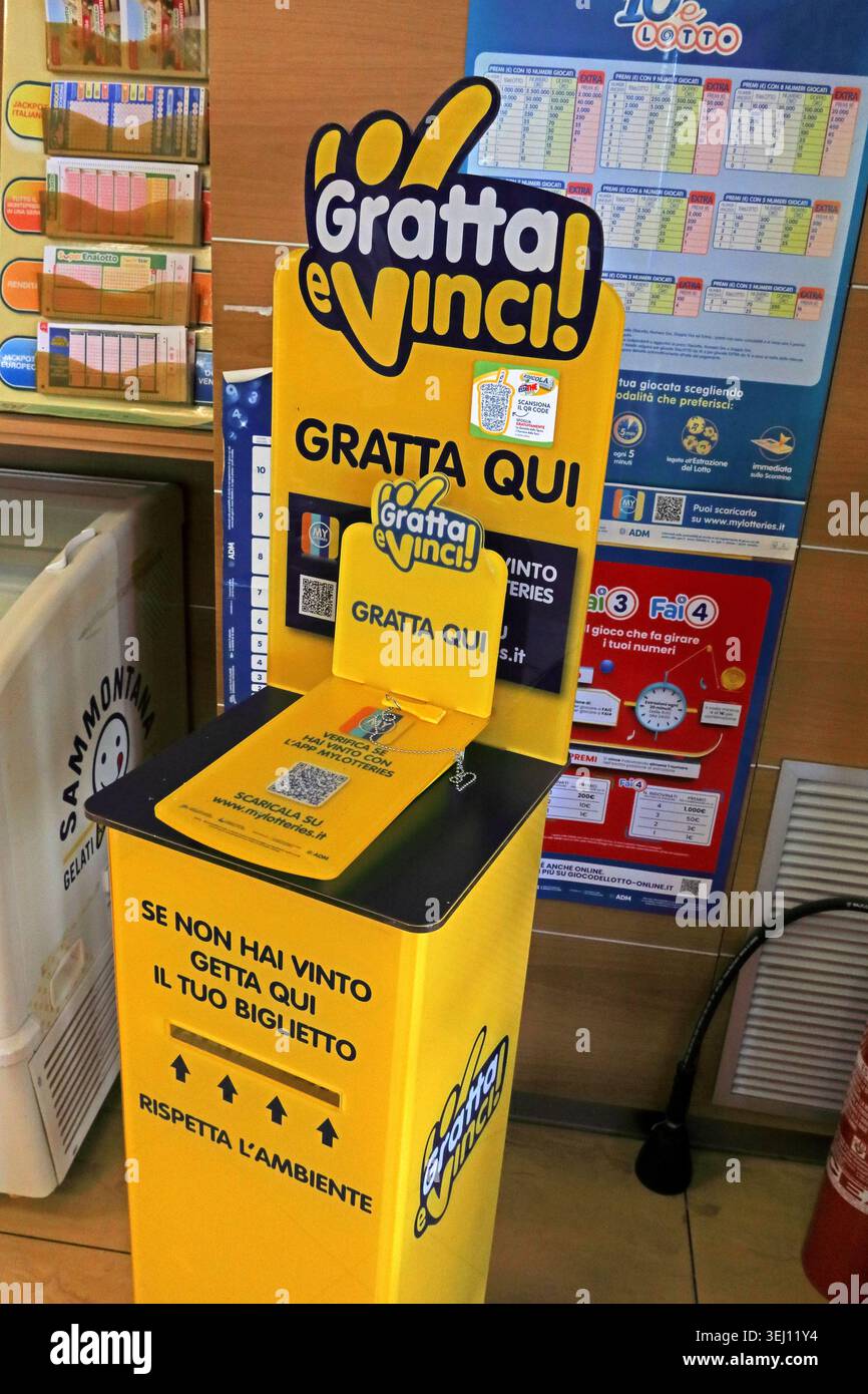 Gratta e Vinci instant scratch-card lottery display inside the Esso Amoil On The Road Café in Barrafranca, Sicily, Italy. Stock Photo