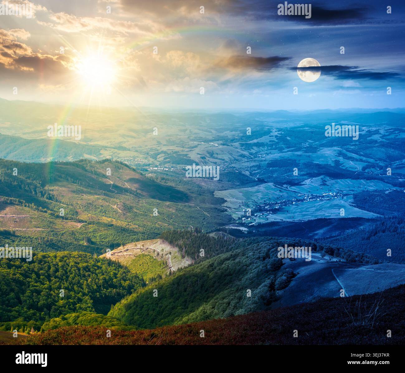 mountainous countryside scenery. day meet night. view of epic sky above the valley. sun and moon in harmony over colorful meadows and trees on hill. b Stock Photo