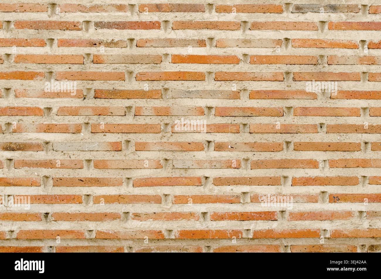 Weathered stained old brick wall background Stock Photo