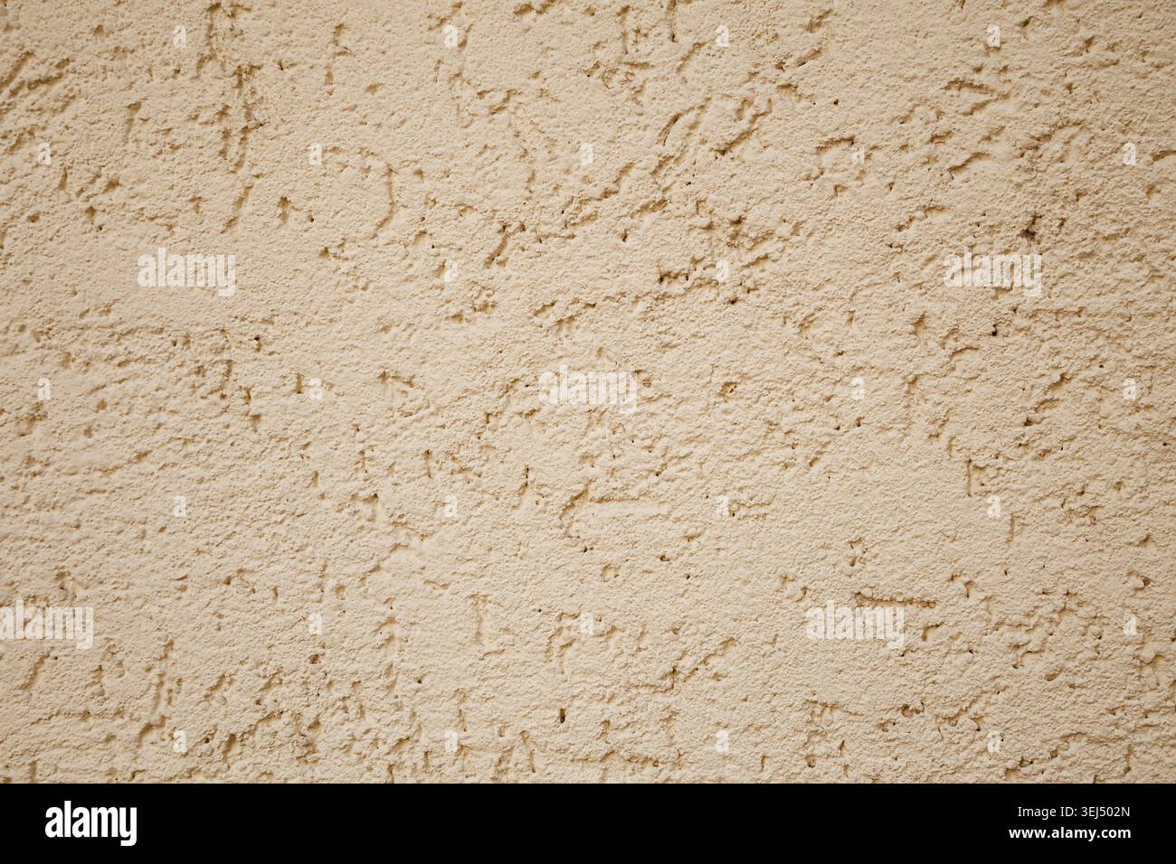 Textured Beige Stucco Wall Surface Stock Photo