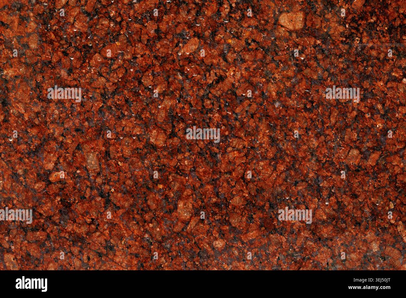 Polished Red Granite Stone Texture Stock Photo