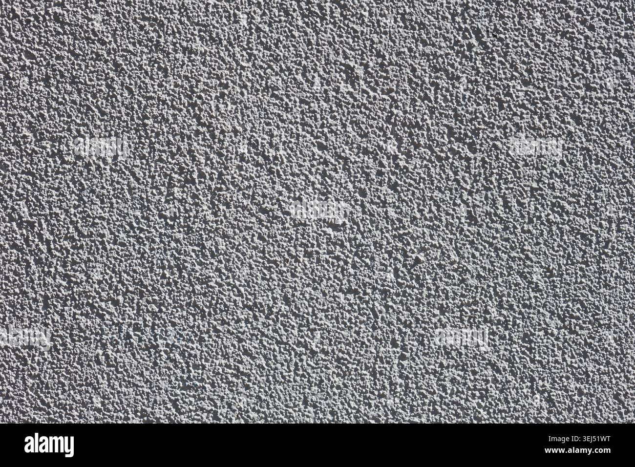 Coarse Grey Textured Plaster Wall Surface Stock Photo
