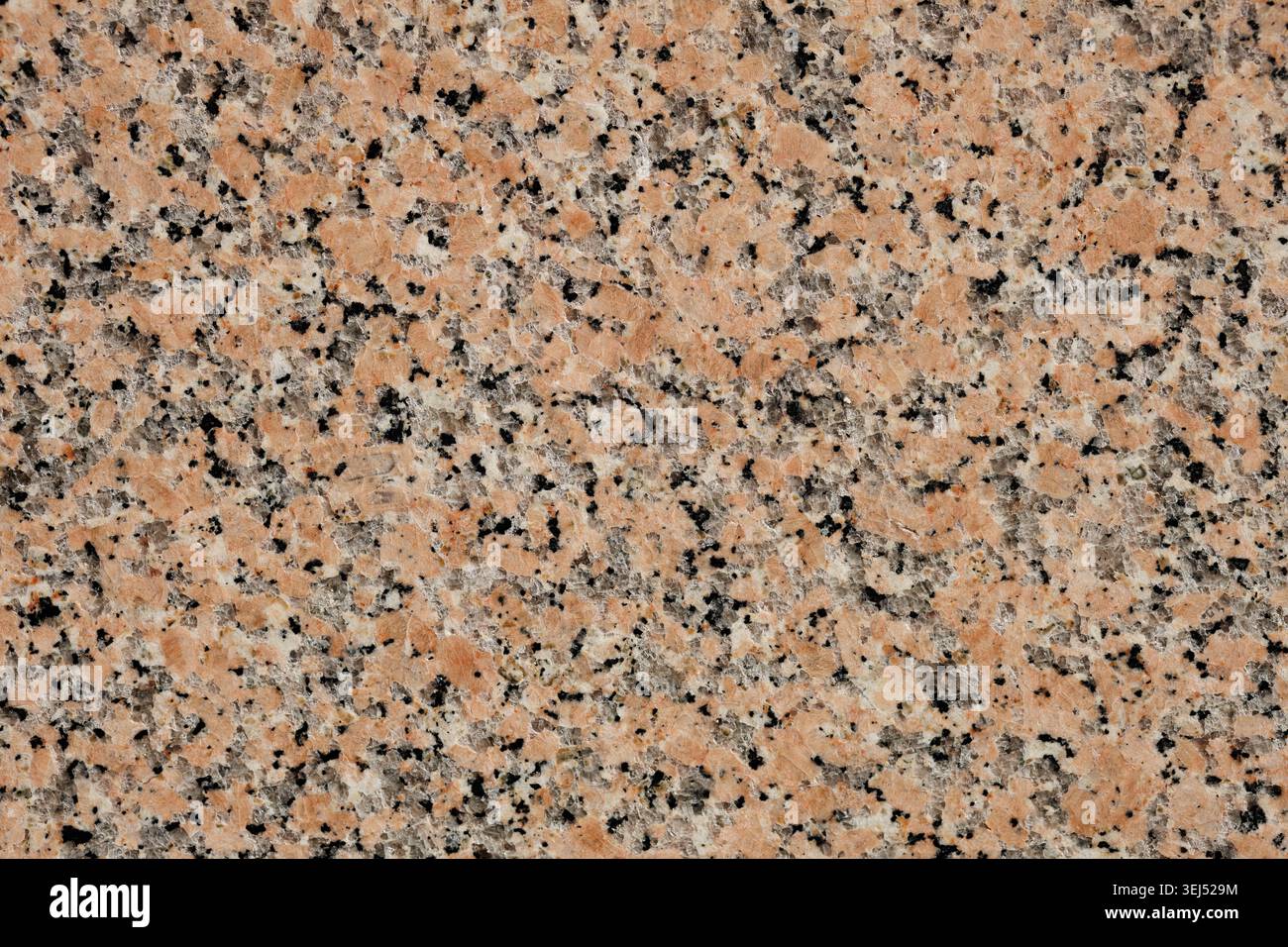 Polished Pink and Black Granite Stone Texture Stock Photo