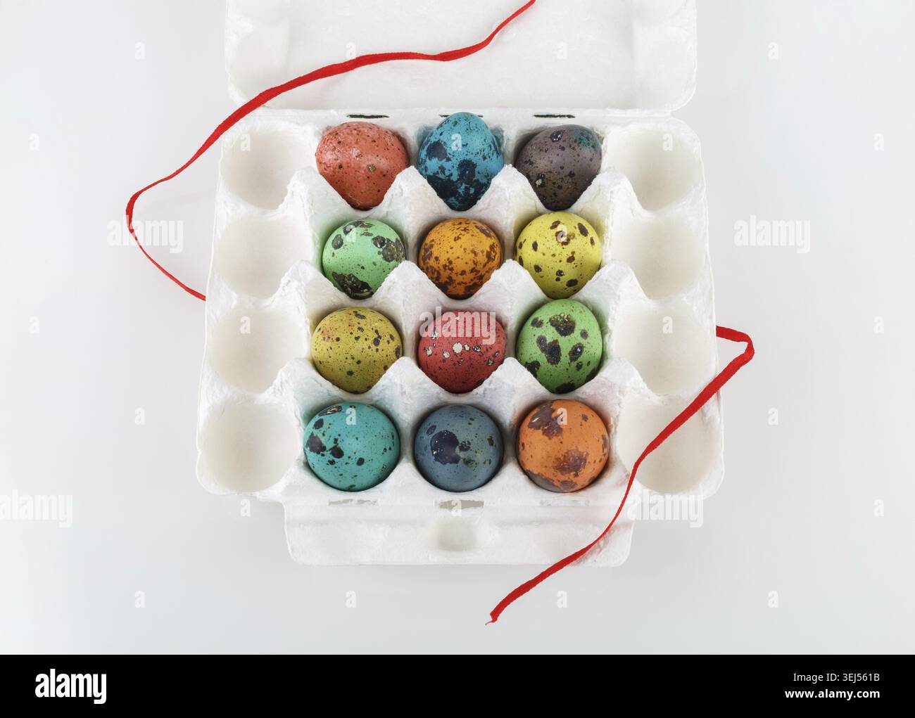 Easter eggs. Colored painted quail eggs in a cardboard box Stock Photo