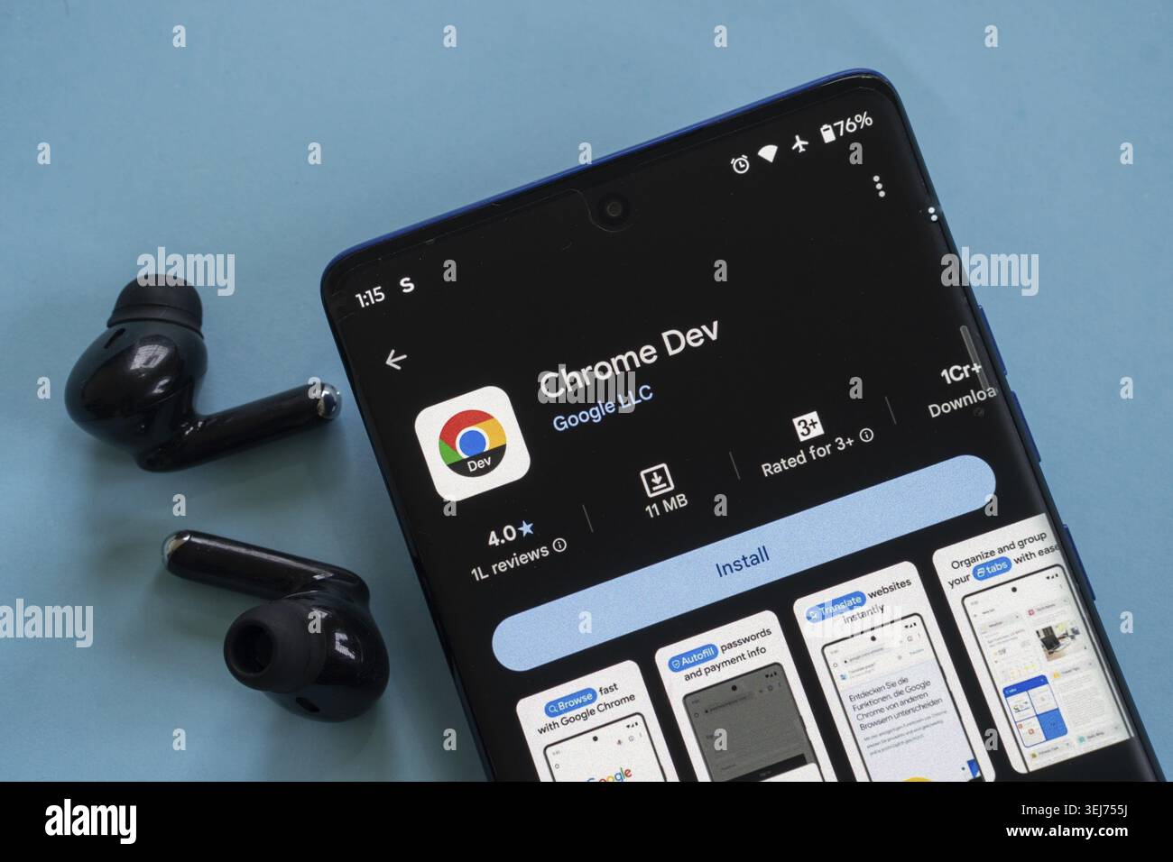 Dhaka, Bangladesh 23 August 2025:A smartphone displaying the Chrome Dev app in the app store with black earphones Stock Photo