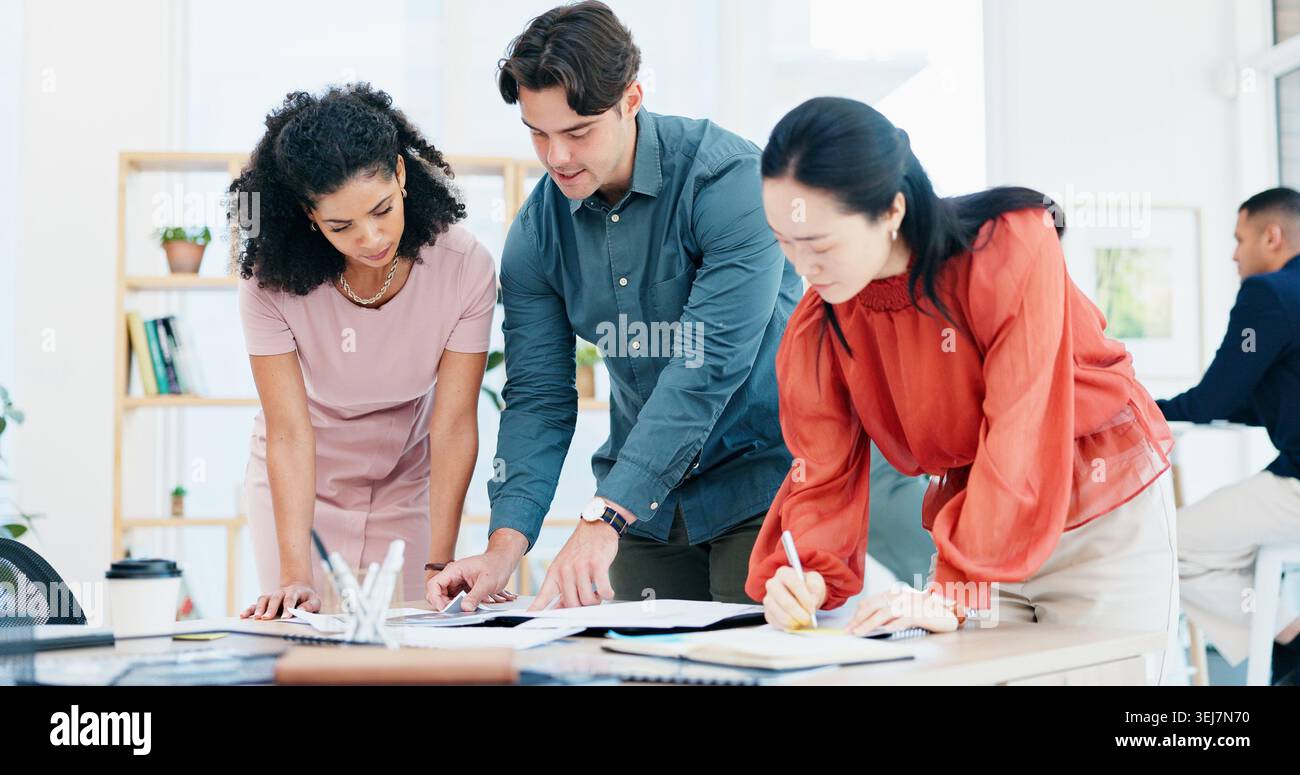 Documents, meeting and discussion with team for business strategy, briefing or schedule in office. Group, employees or creative people with paperwork Stock Photo