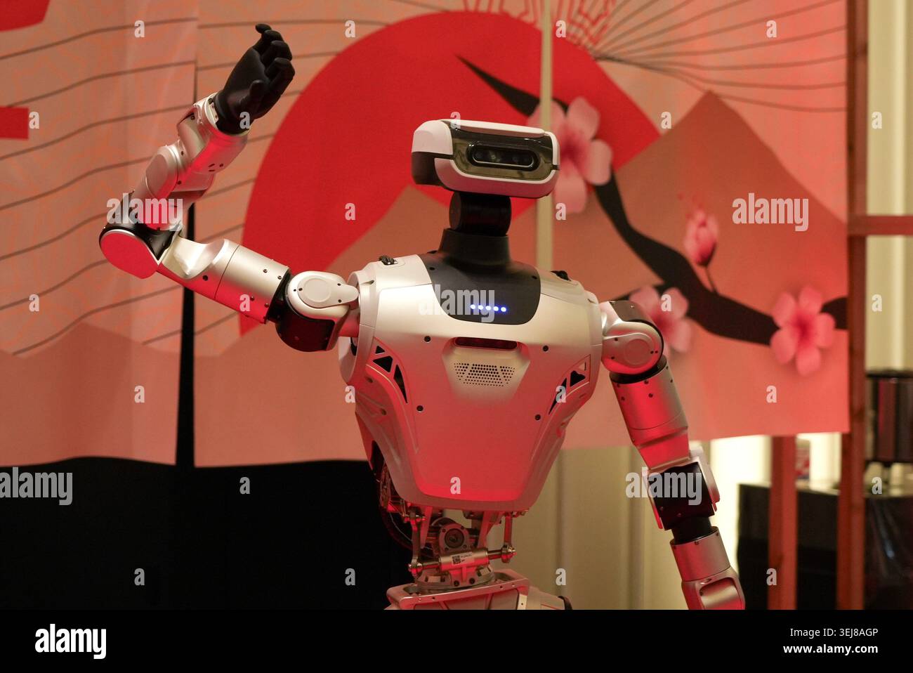 A humanoid robot poses for photo at the Humanoids Summit 2026 in Tokyo ...