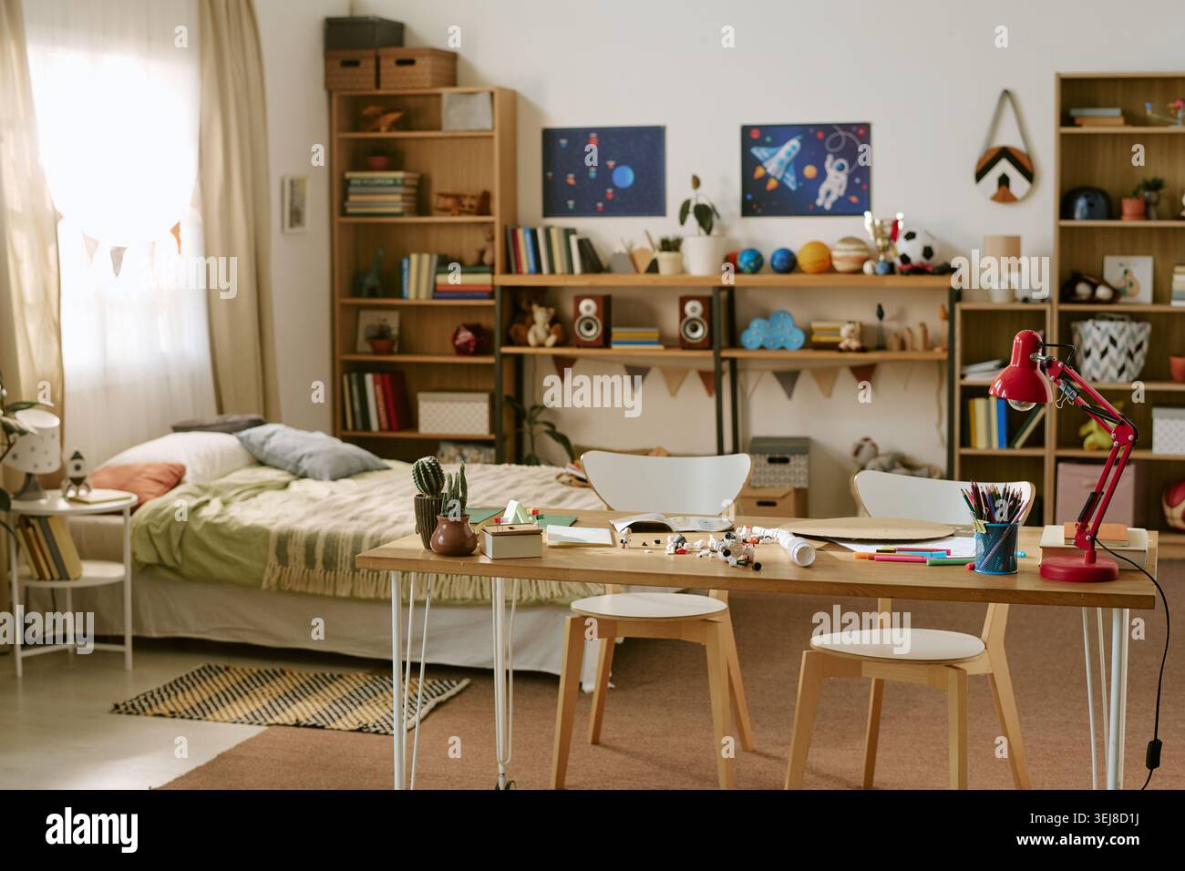 Kids Bedroom Interior Featuring Space Themed Decor Stock Photo
