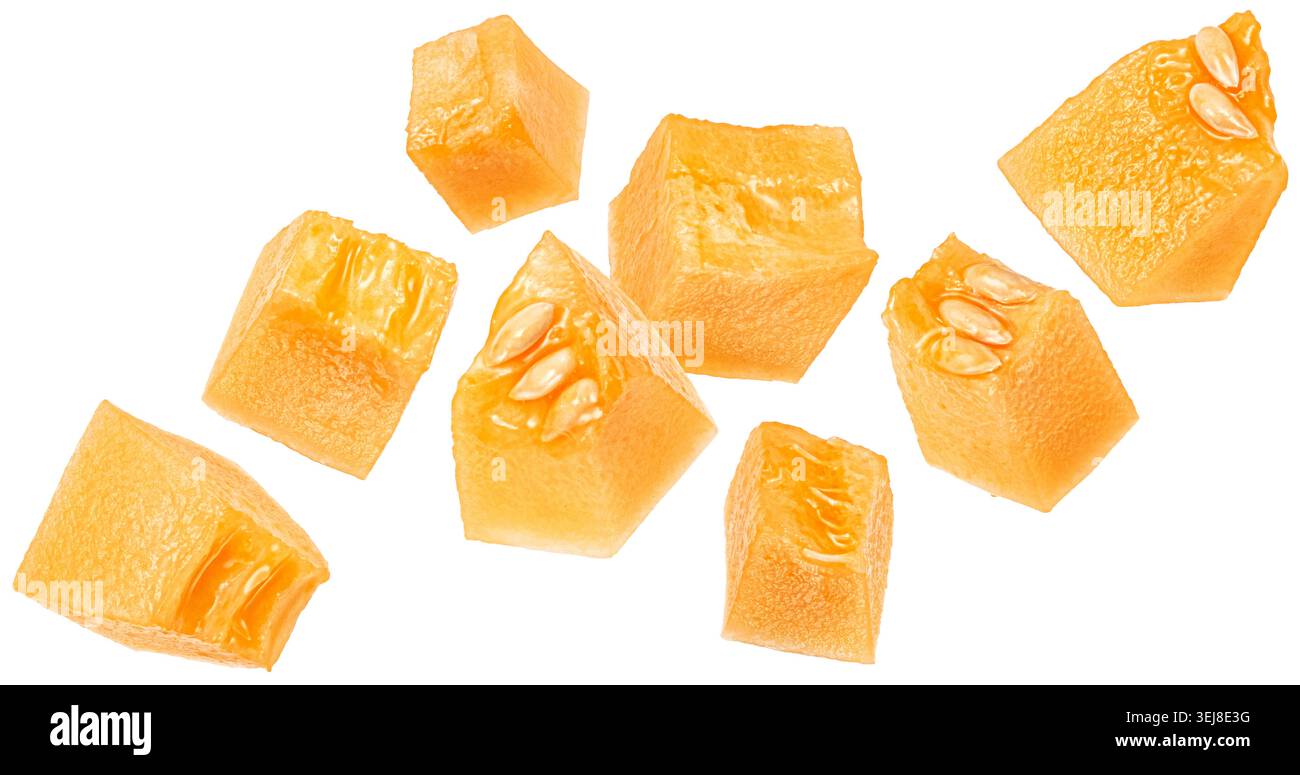 Sweet melon pulp cubes isolated on white background with clipping path Stock Photo