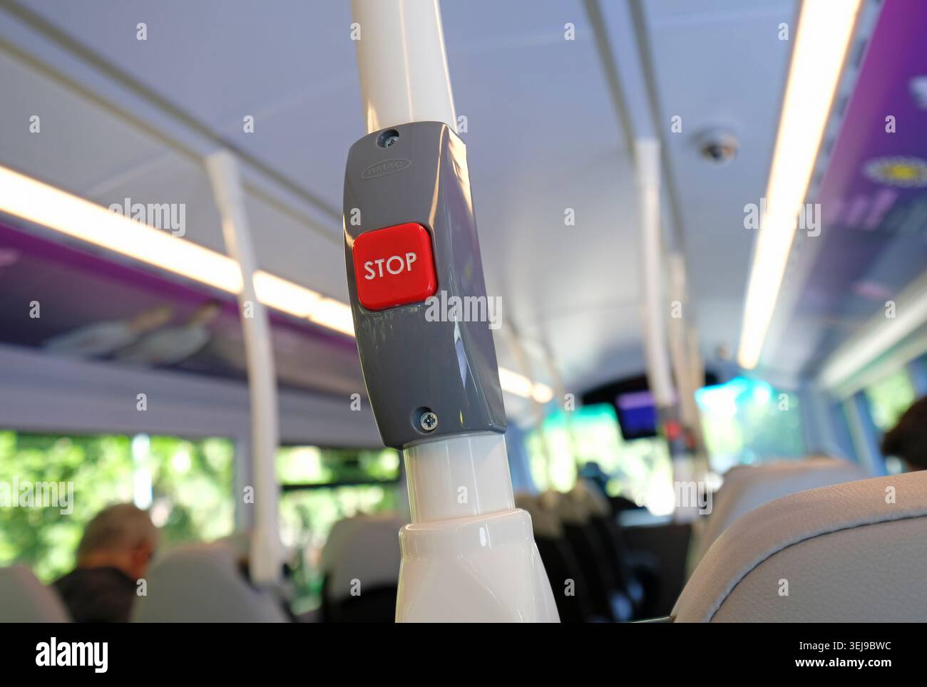 red stop button on bus, norfolk, england Stock Photo