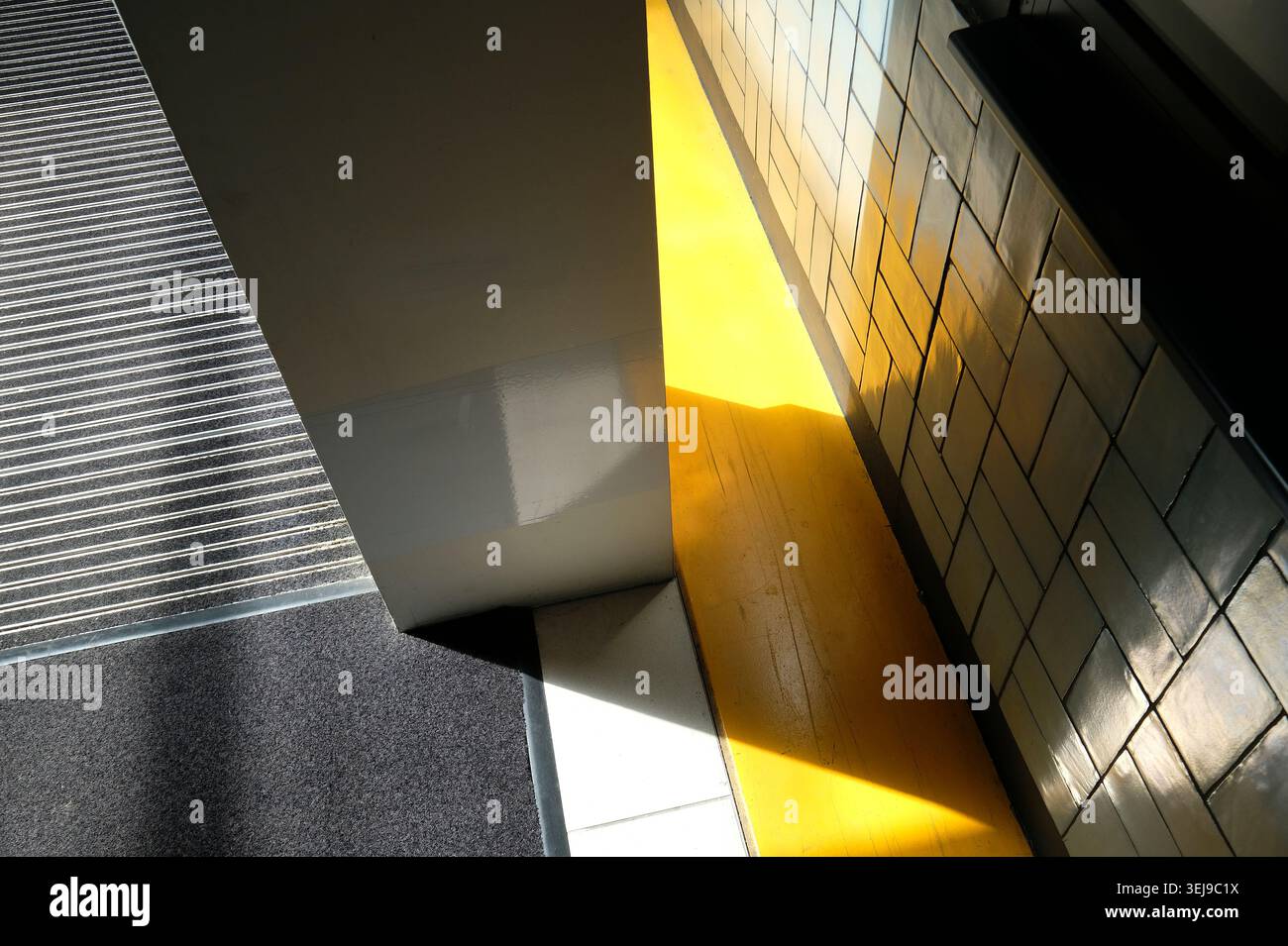 linear abstract shapes, bright yellow stripe flooring effect Stock Photo