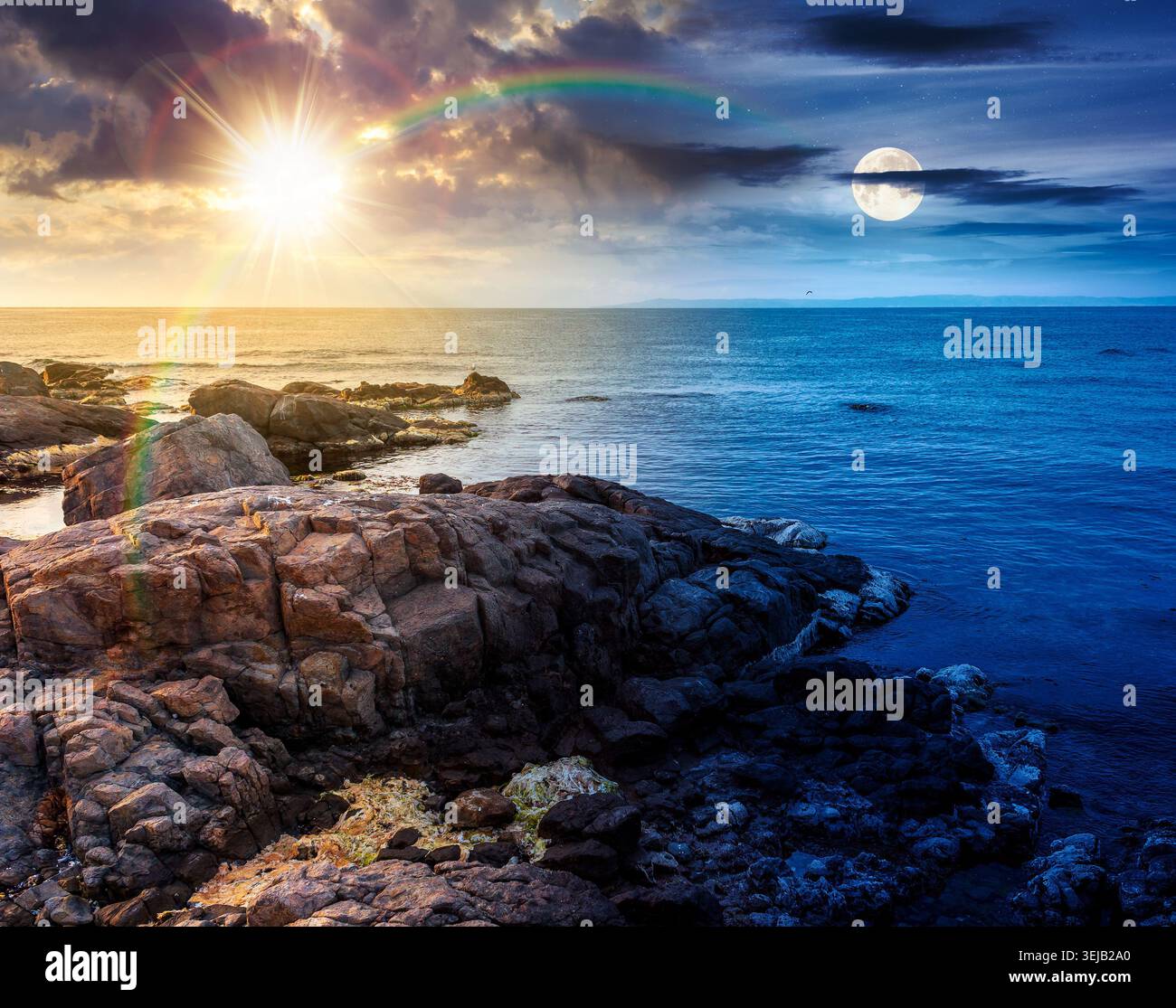 sea coast with stones and rocks. day meet night. summer vacation background at twilight. sun and moon in harmony over seascape with rough terrain. rel Stock Photo